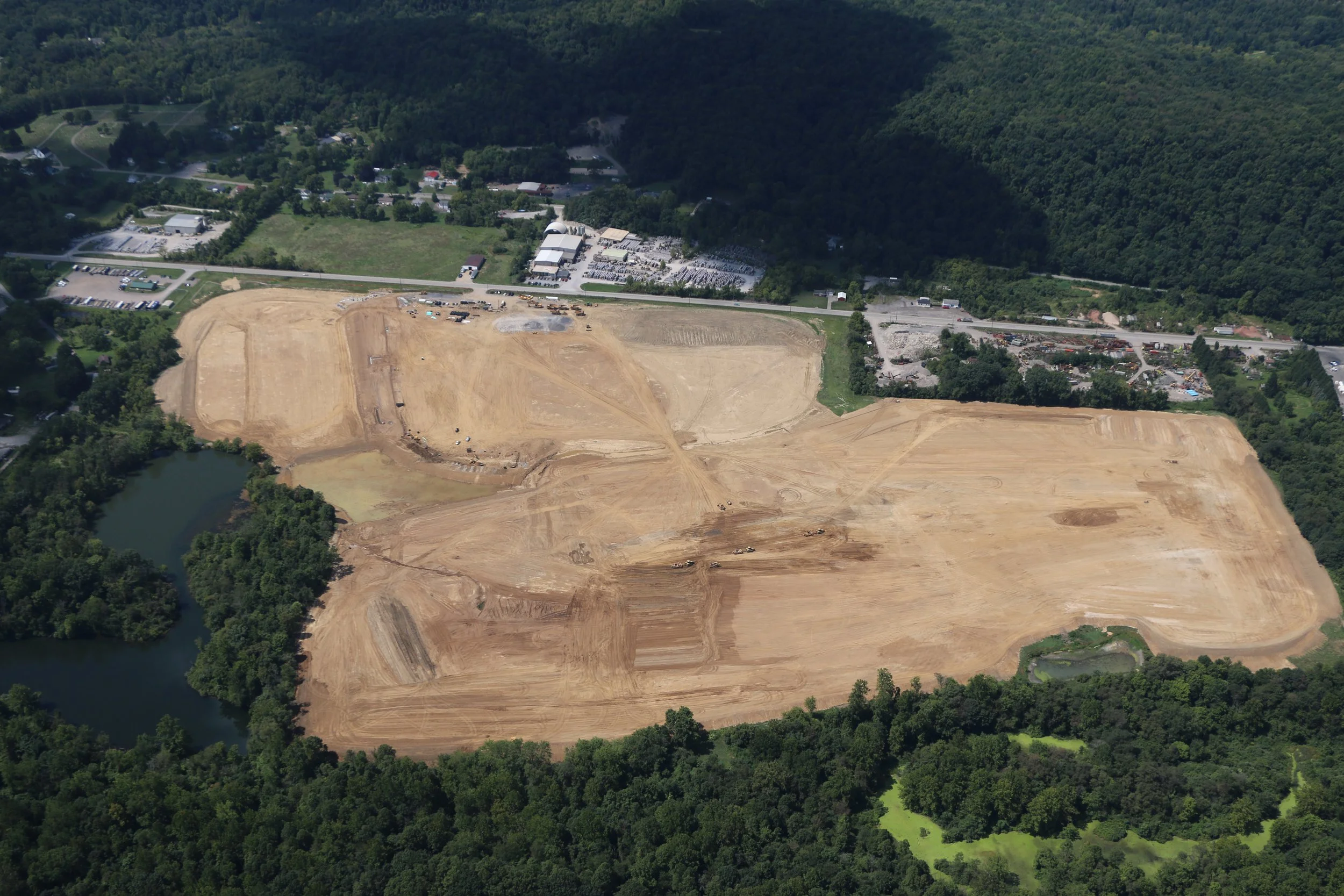 Overhead drone shot of a construction zone in Western Pennsylvania, taken by Ian Jones in Pittsburgh, showcasing industrial development and construction expertise by LaCarte Enterprises.