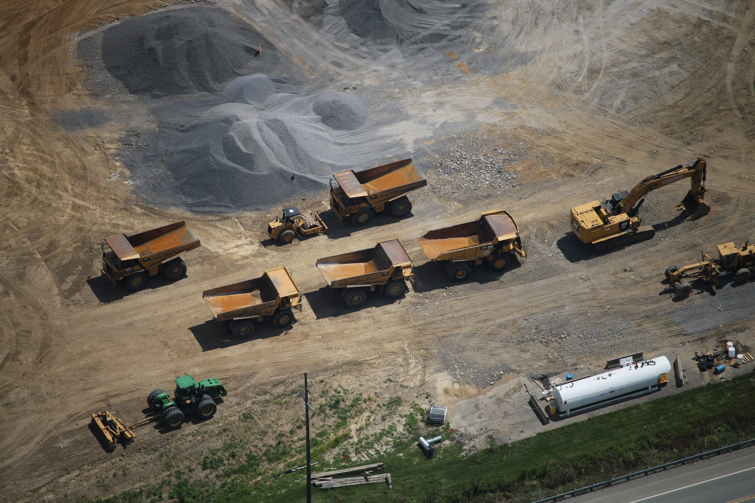 Overhead drone shot of a construction zone in Western Pennsylvania, taken by Ian Jones in Pittsburgh, showcasing industrial development and construction expertise by LaCarte Enterprises.
