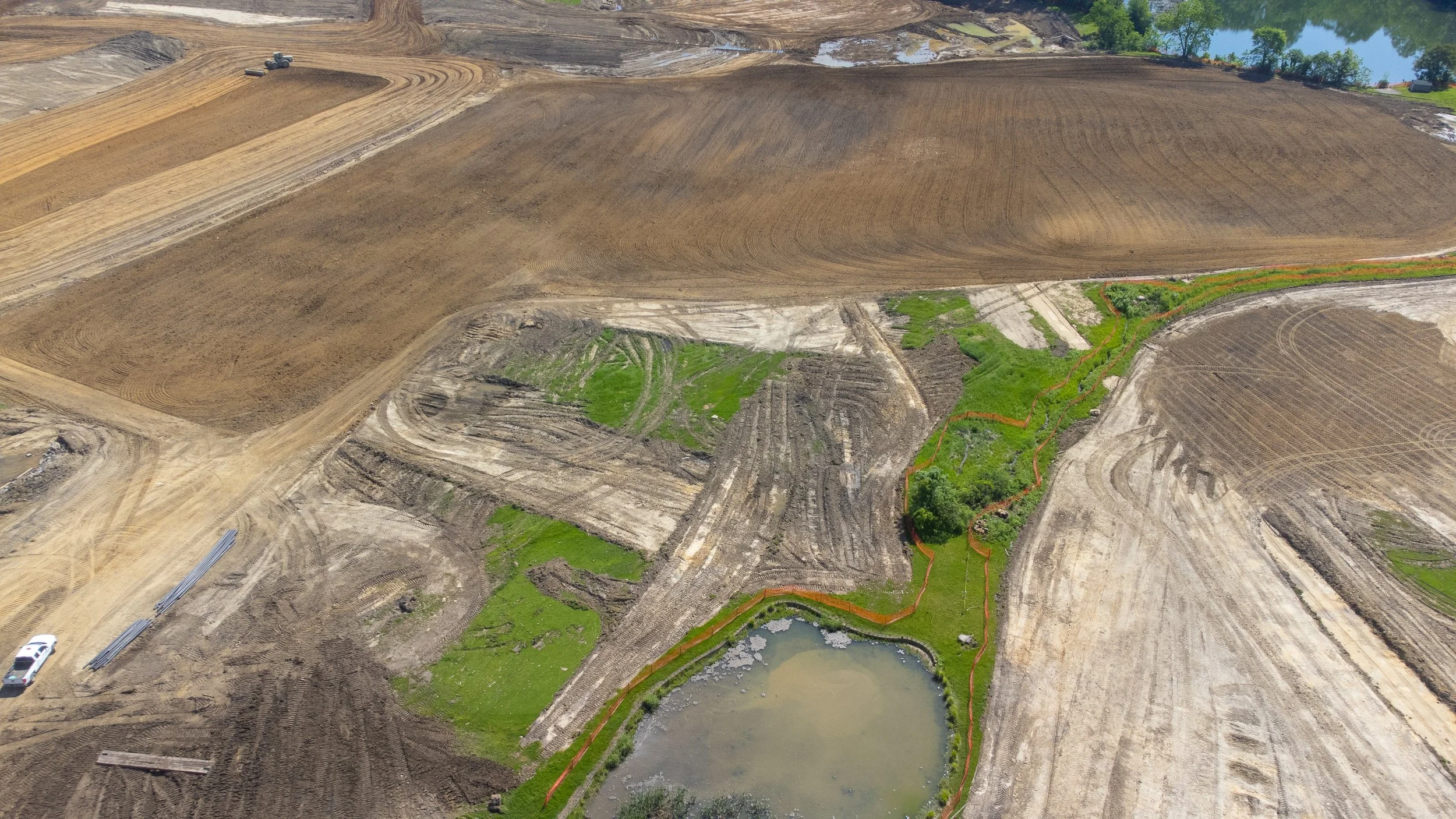 Overhead drone shot of a construction zone in Western Pennsylvania, taken by Ian Jones in Pittsburgh, showcasing industrial development and construction expertise by LaCarte Enterprises.