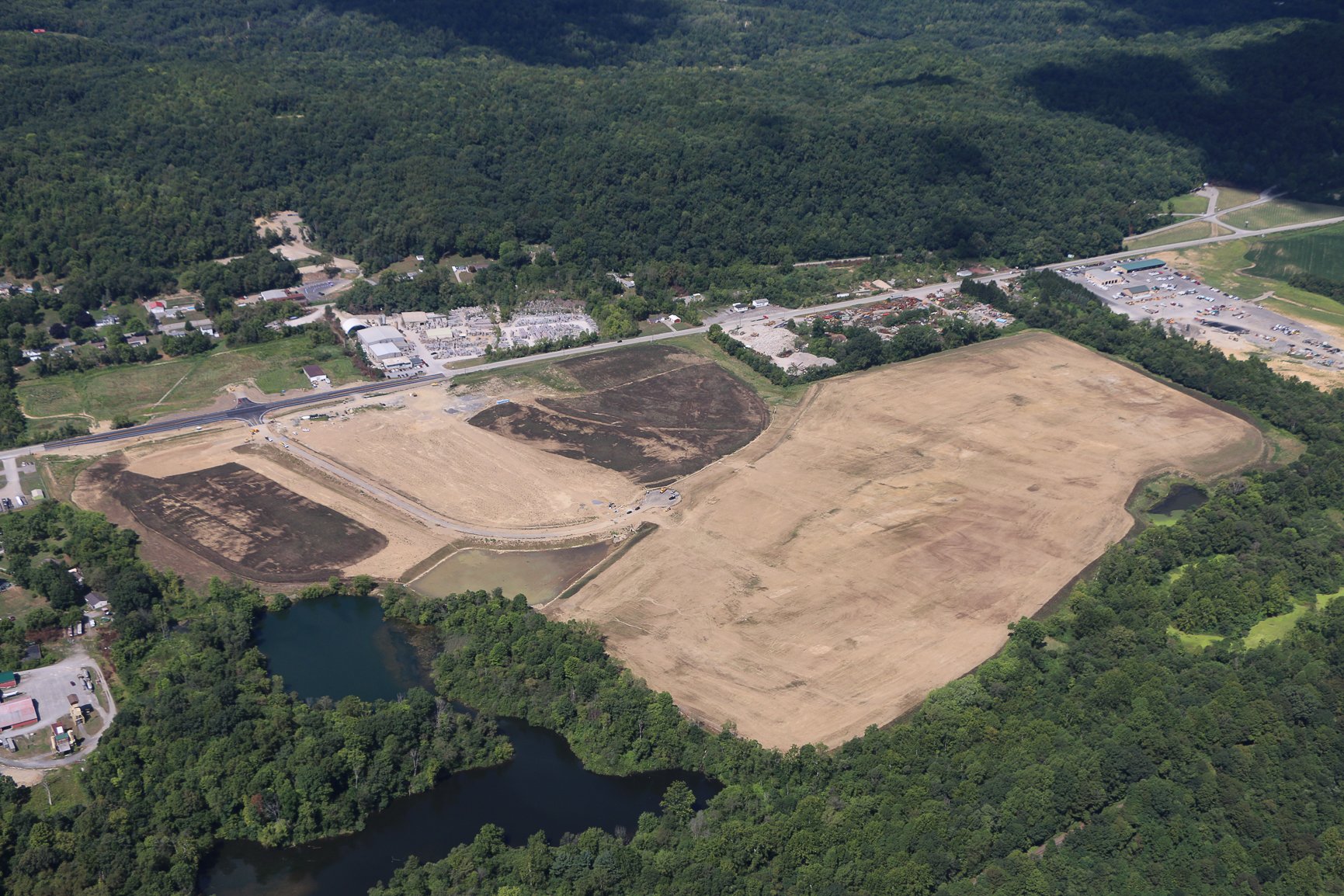 Wide drone aerial of Stonecrest Business Park construction in New Beaver, Pennsylvania.