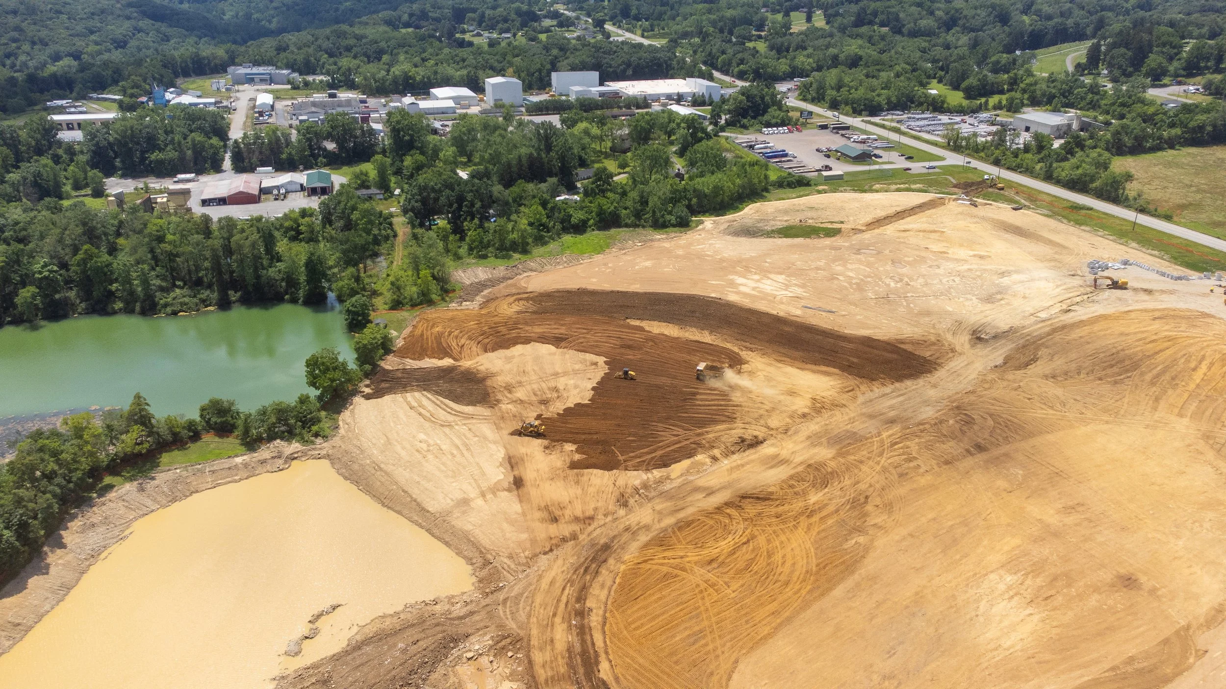 Overhead drone shot of a construction zone in Western Pennsylvania, taken by Ian Jones in Pittsburgh, showcasing industrial development and construction expertise by LaCarte Enterprises.
