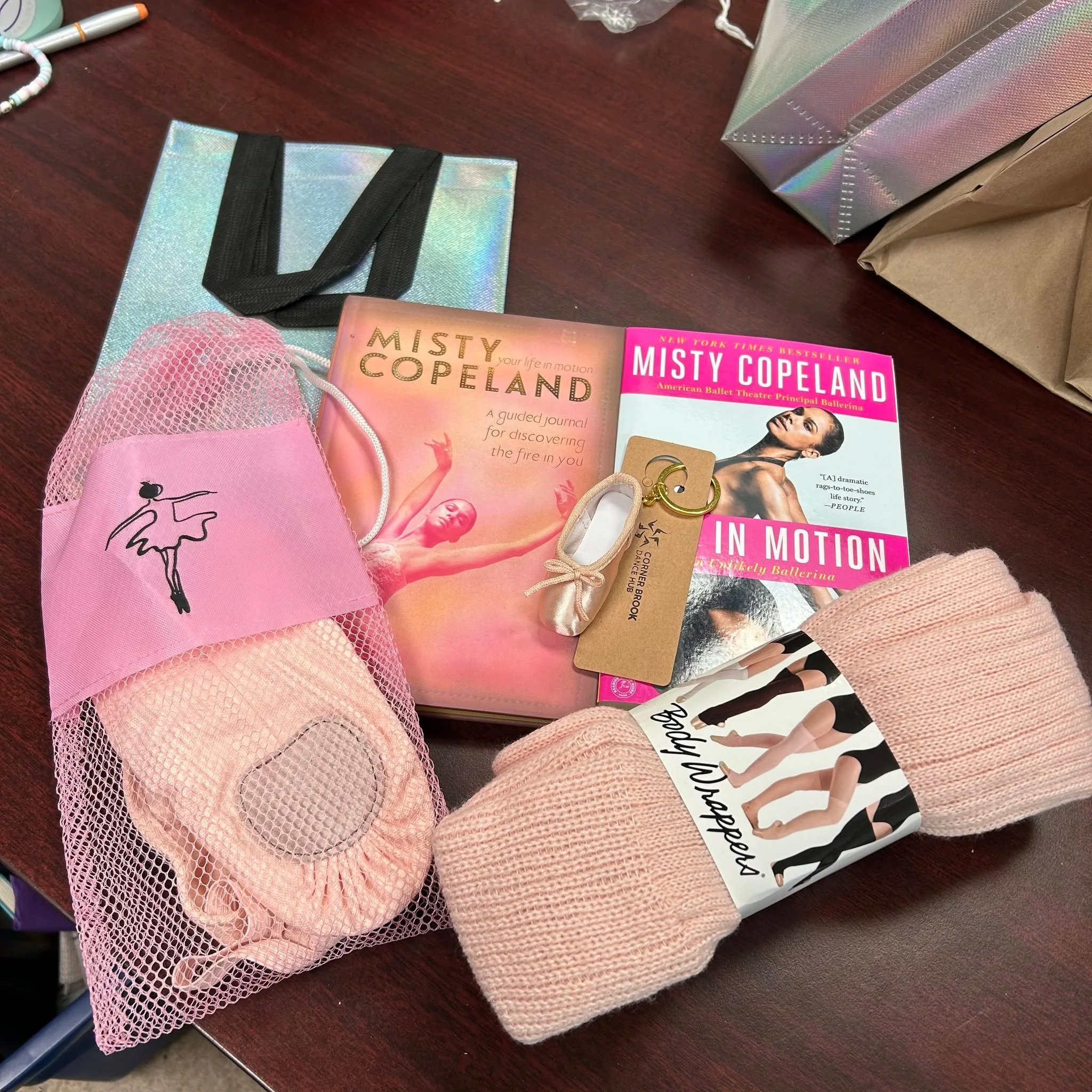 In the office this morning gift-wrapping some last-minute gifts orders for people who's orders are stuck in Dieppe!

A gift basket for a ballet loving teen;
A ballet stocking for a preK dancer;
A Nutcracker gift set for a young dancer; 
and a new Yog