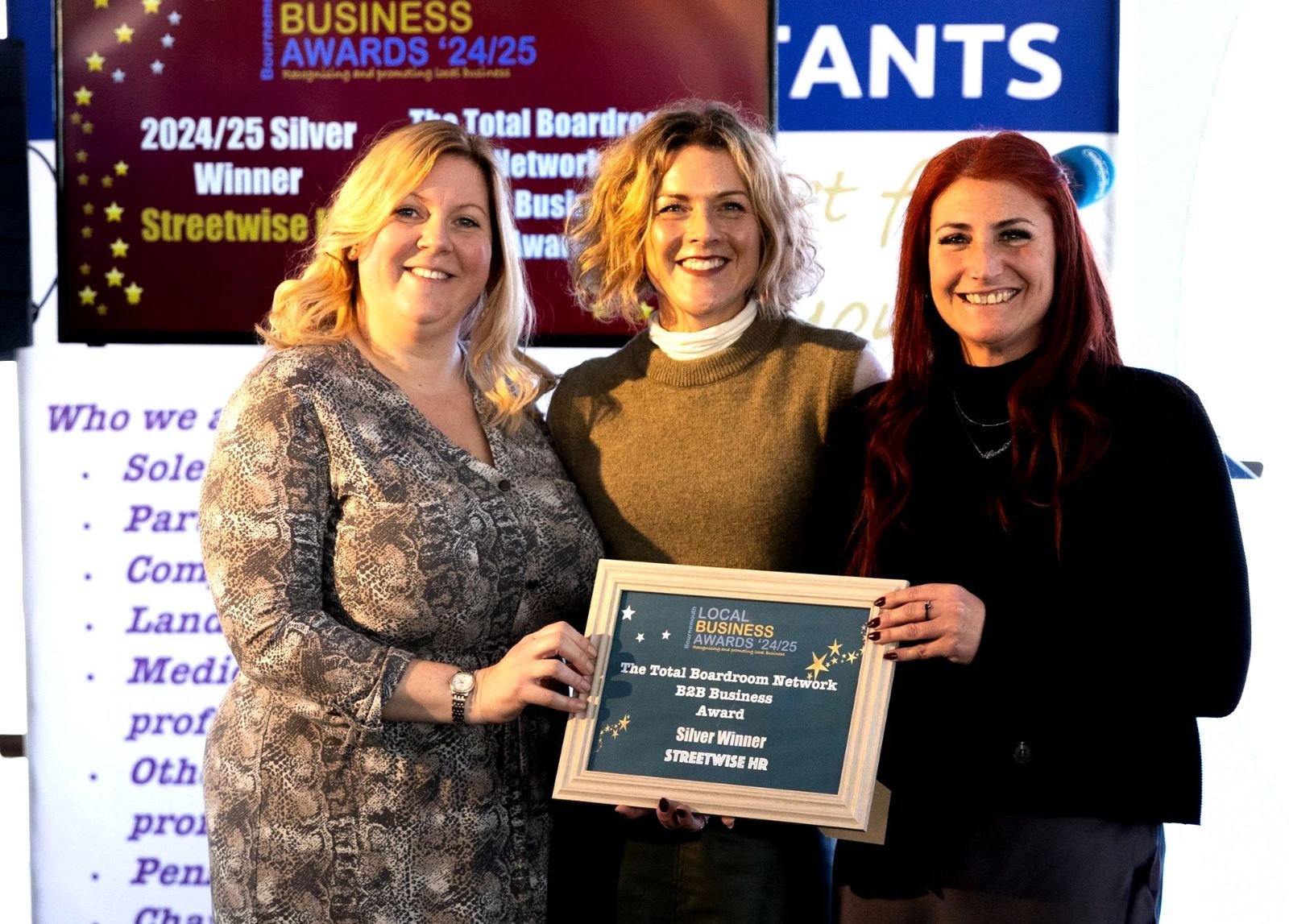 Debbie and Kim receiving an award for silver B2B business award for BCP 2025