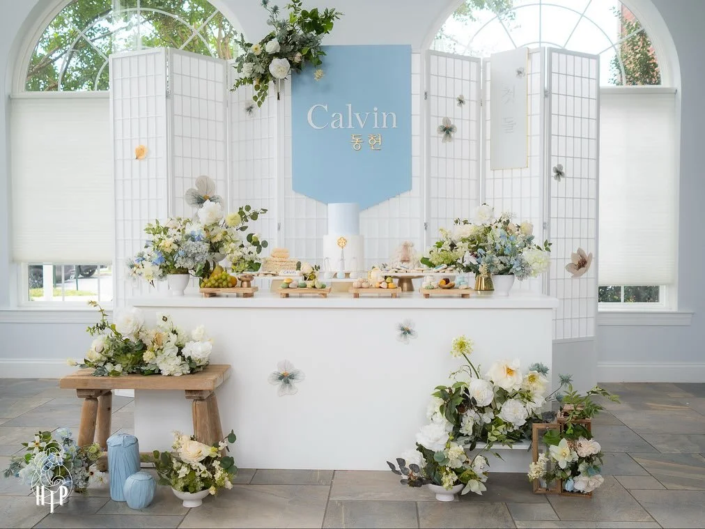 Still thinking about how beautifully arranged the dol table was at Calvin&rsquo;s doljanchi a few weeks ago. Every detail &mdash; from the vibrant fruits and rice cakes to the floral arrangements and custom-baked cookies &mdash; was so thoughtfully p