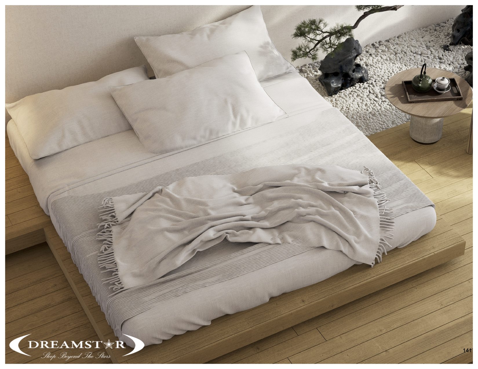 A white bed on a wooden platform