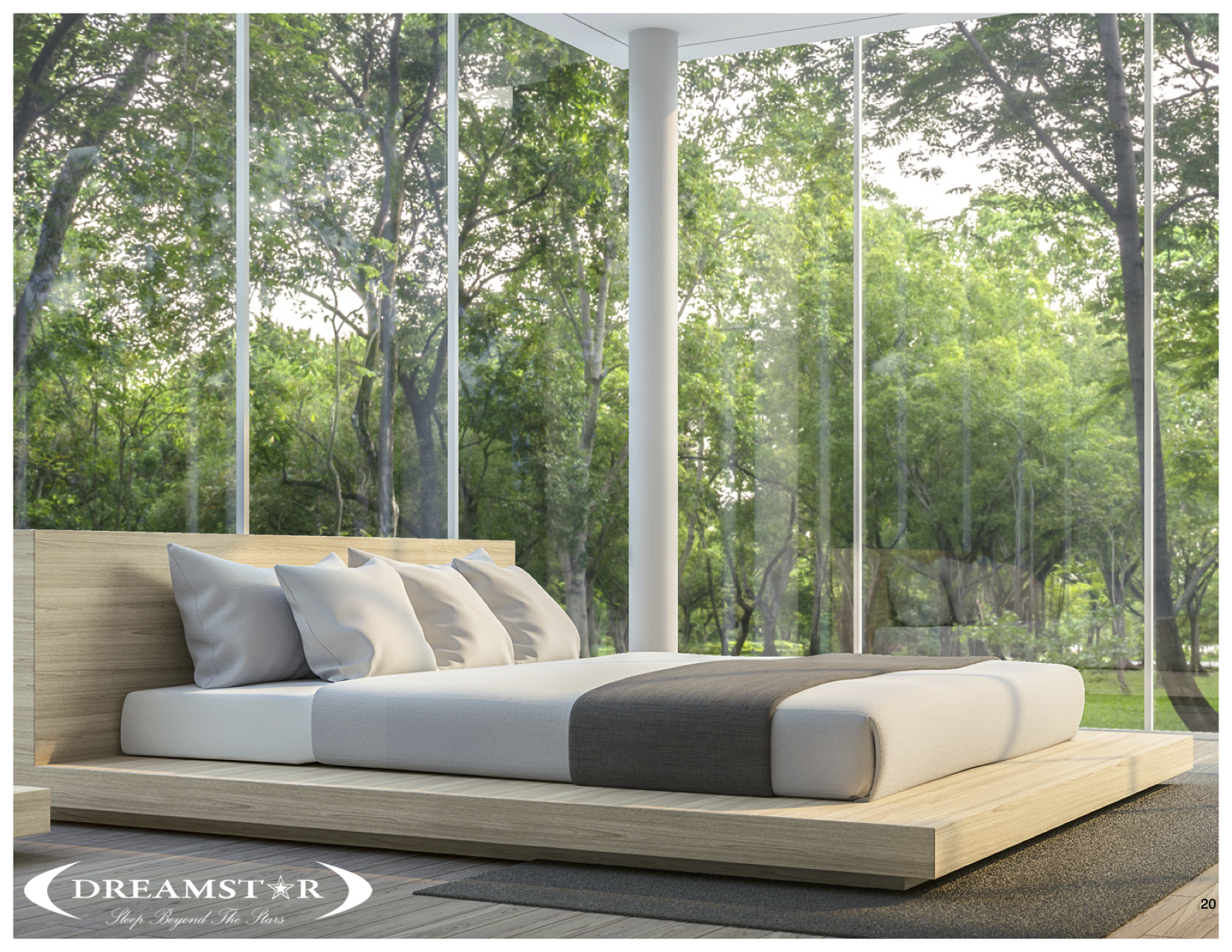 A bed against a window in a forest