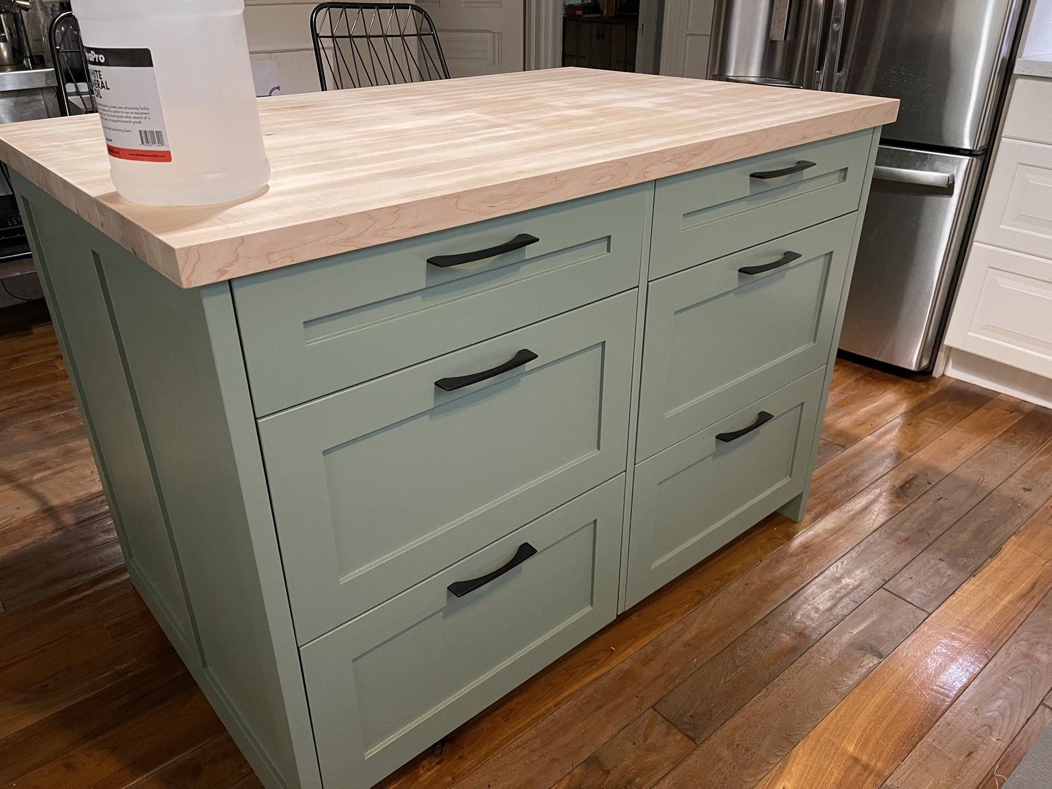 Kitchen island with drawers and maple butcher block countertop