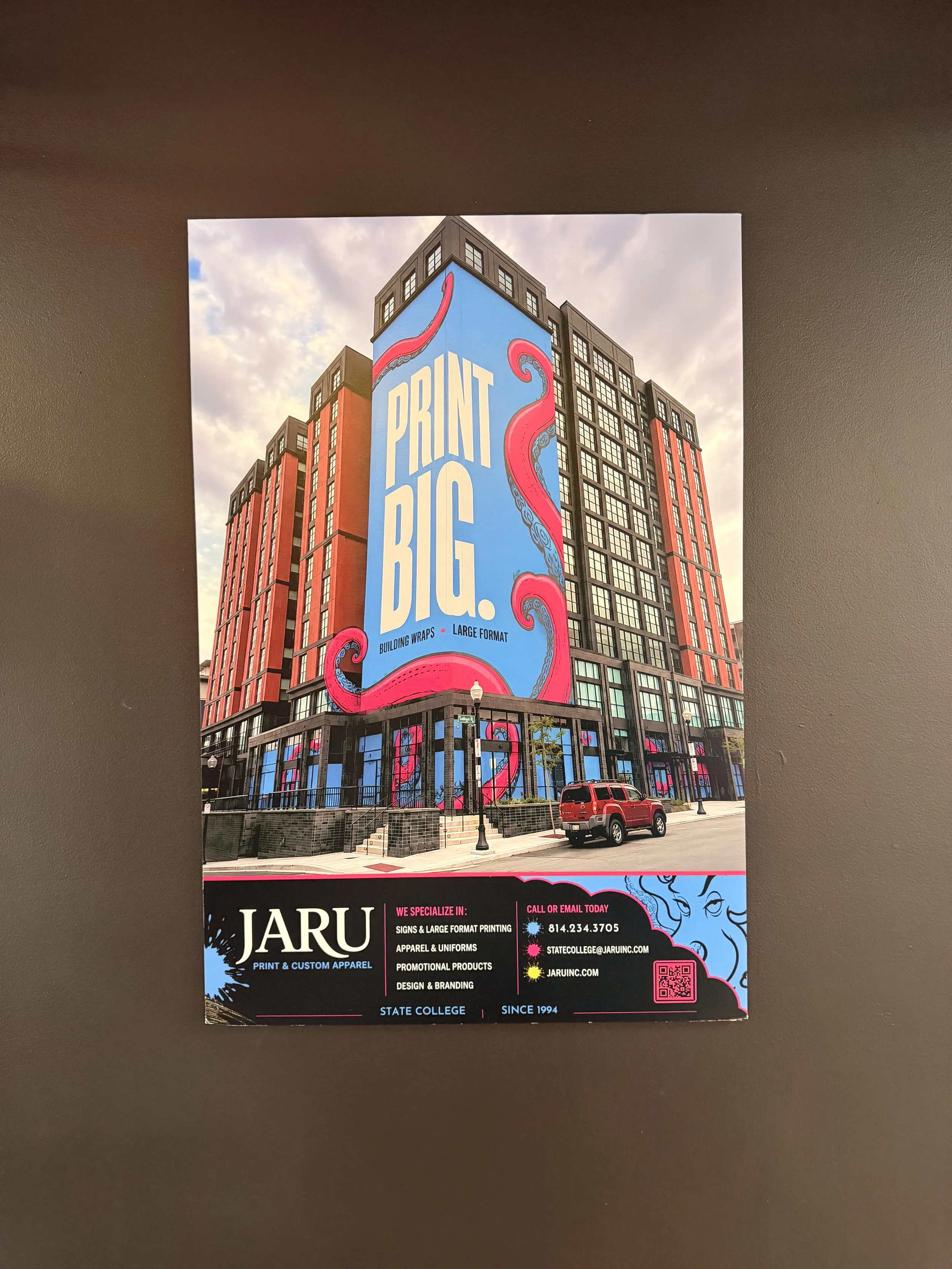 Large-format poster printing near Penn State in Happy Valley: custom downtown State College building poster by Jaru Print and Custom Apparel