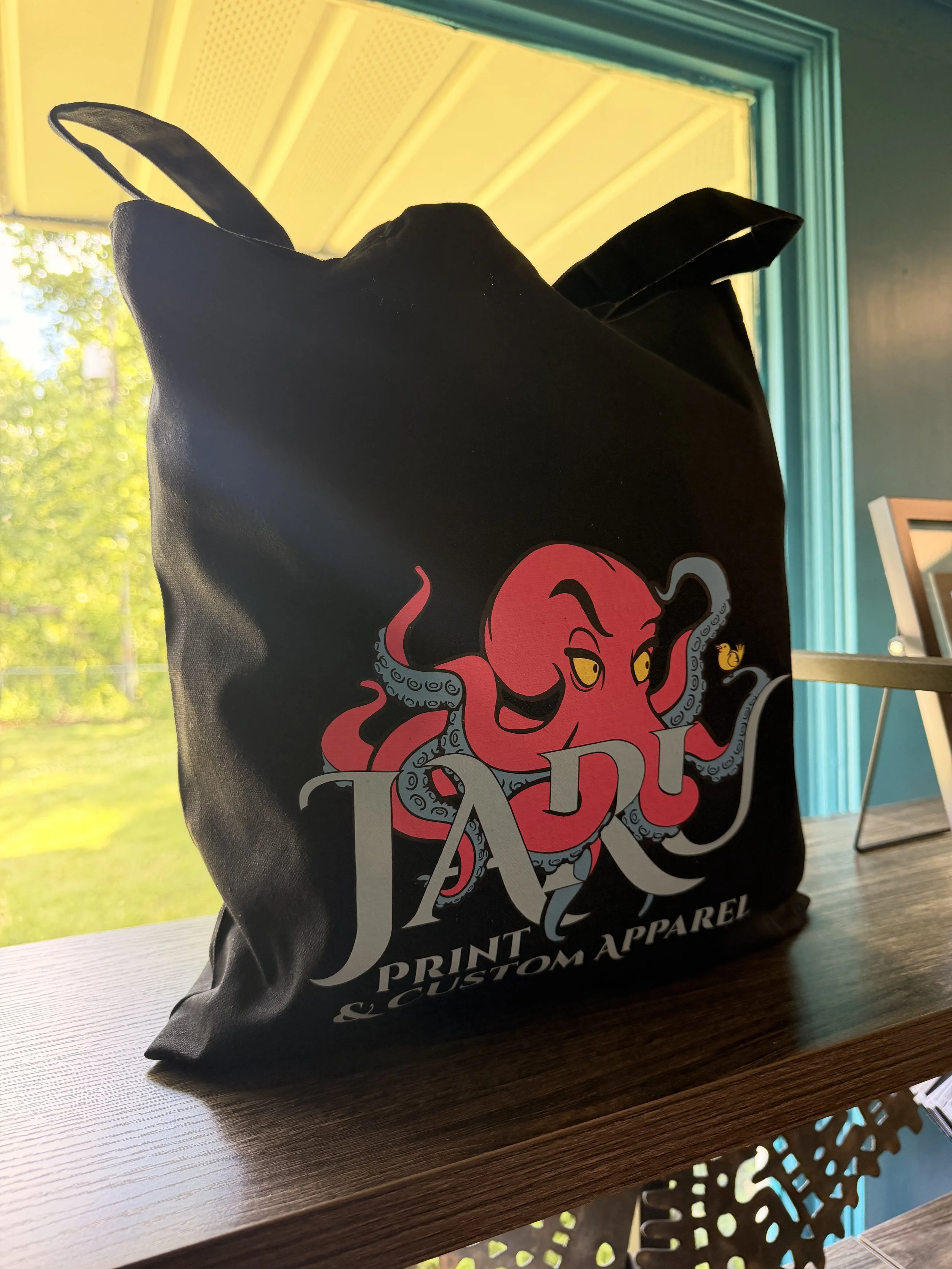Custom printed tote bag with the Jaru octopus logo, promotional products in State College, PA