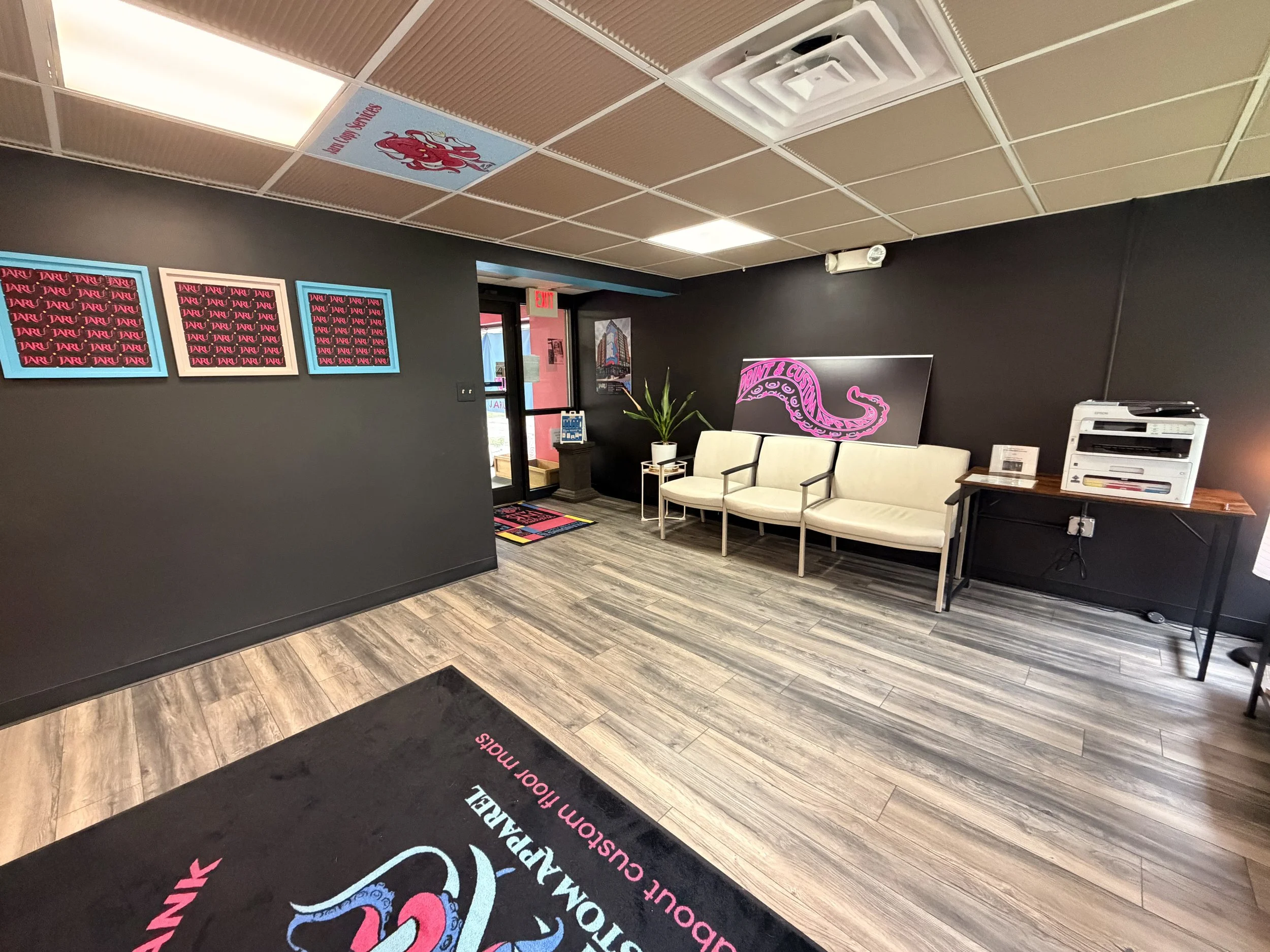 Jaru Print and Custom Apparel print shop interior in State College, PA (Happy Valley) with custom printed floor mats