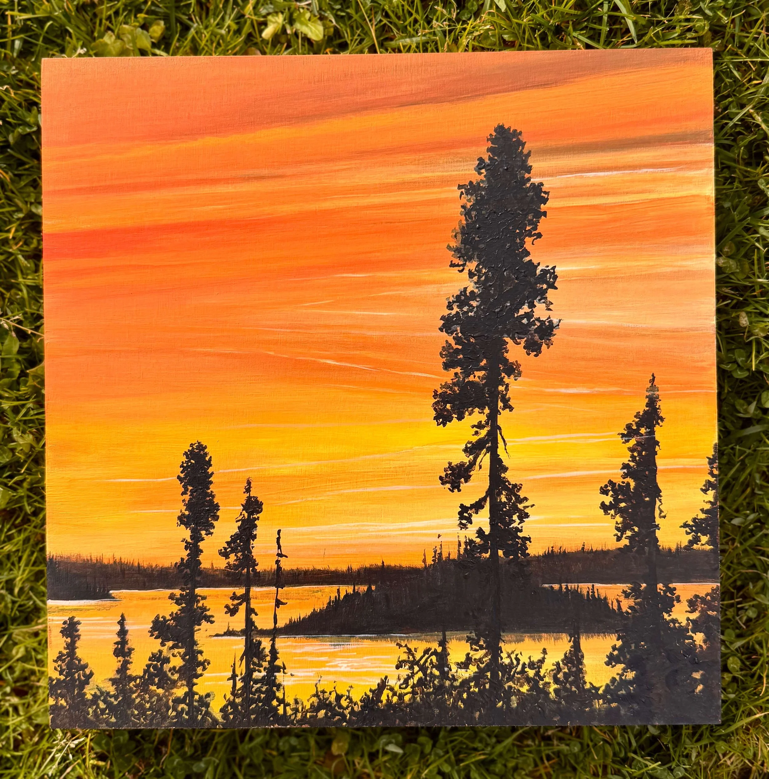une oeuvre acrylique sur toile en bois avec coucher de soleil et épinette noire