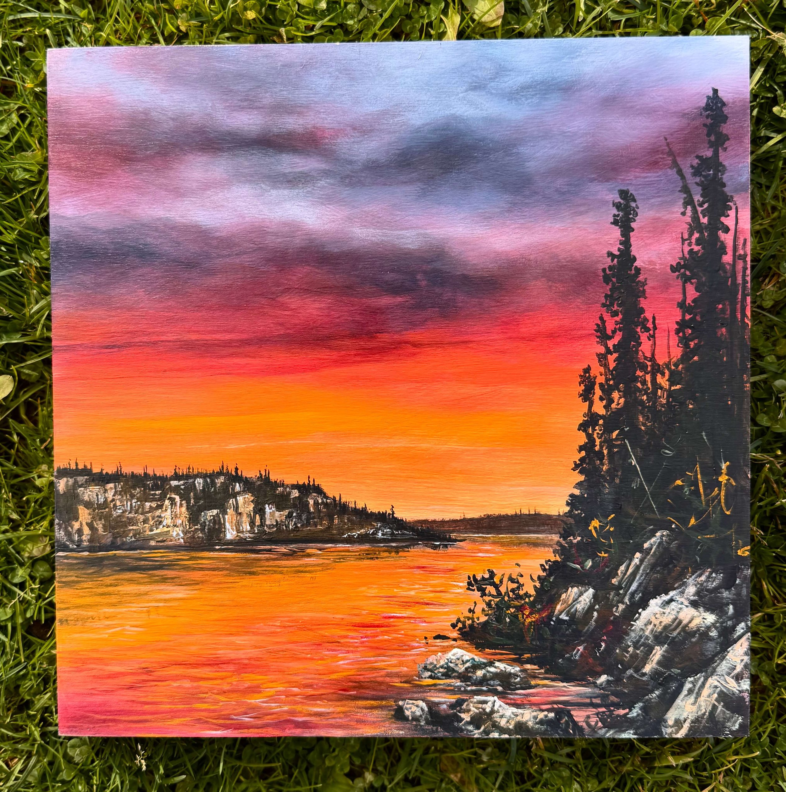 une oeuvre acrylique sur bois avec des couleurs vives de coucher de soleil