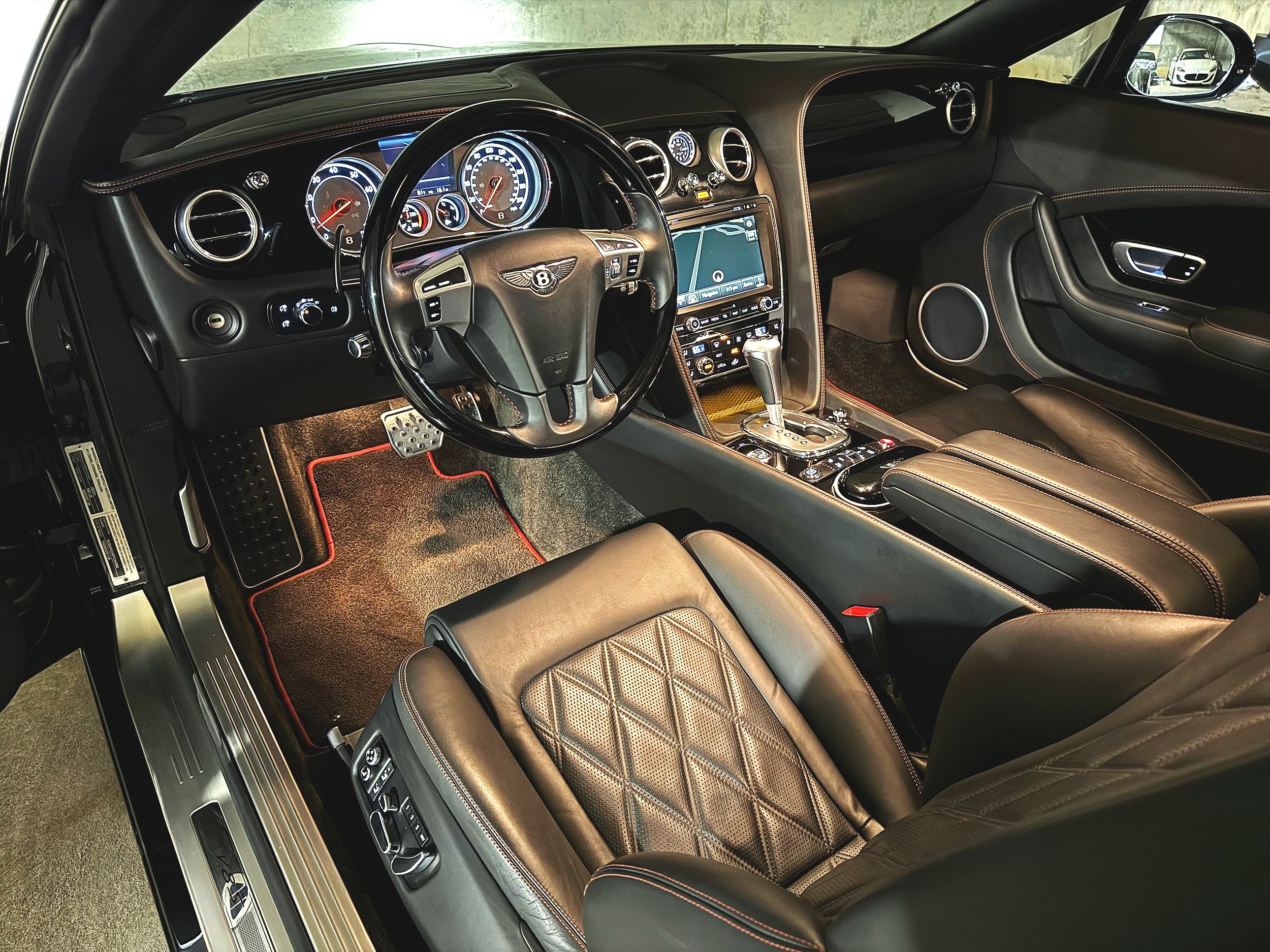 Hand Stitching to Steering Wheel in Contrasting Color Wood and Hide Steering Wheel (3 Spoke)Contrast Binding to Carpet Overmats Drilled Alloy Sports Foot Pedals Contrast Stitching