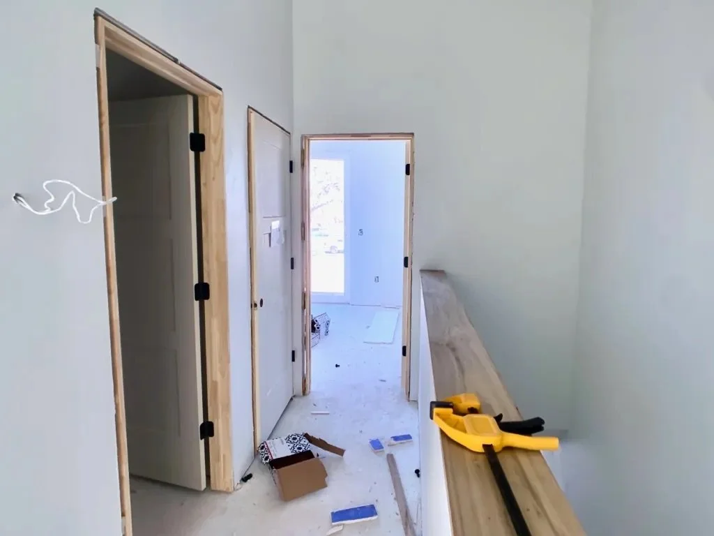  Image of Lively Lane Phase 1 townhome interior with door frames being installed. 
