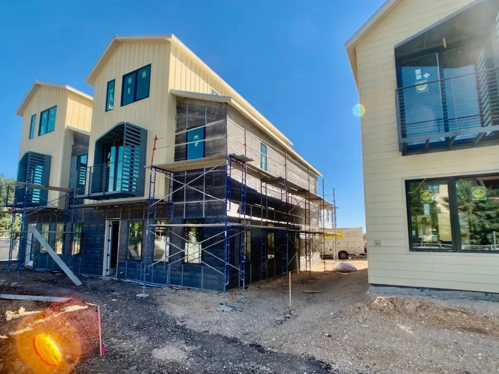  Image of a Lively Lane Phase 1 live-work townhome being prepped for stucco install. 