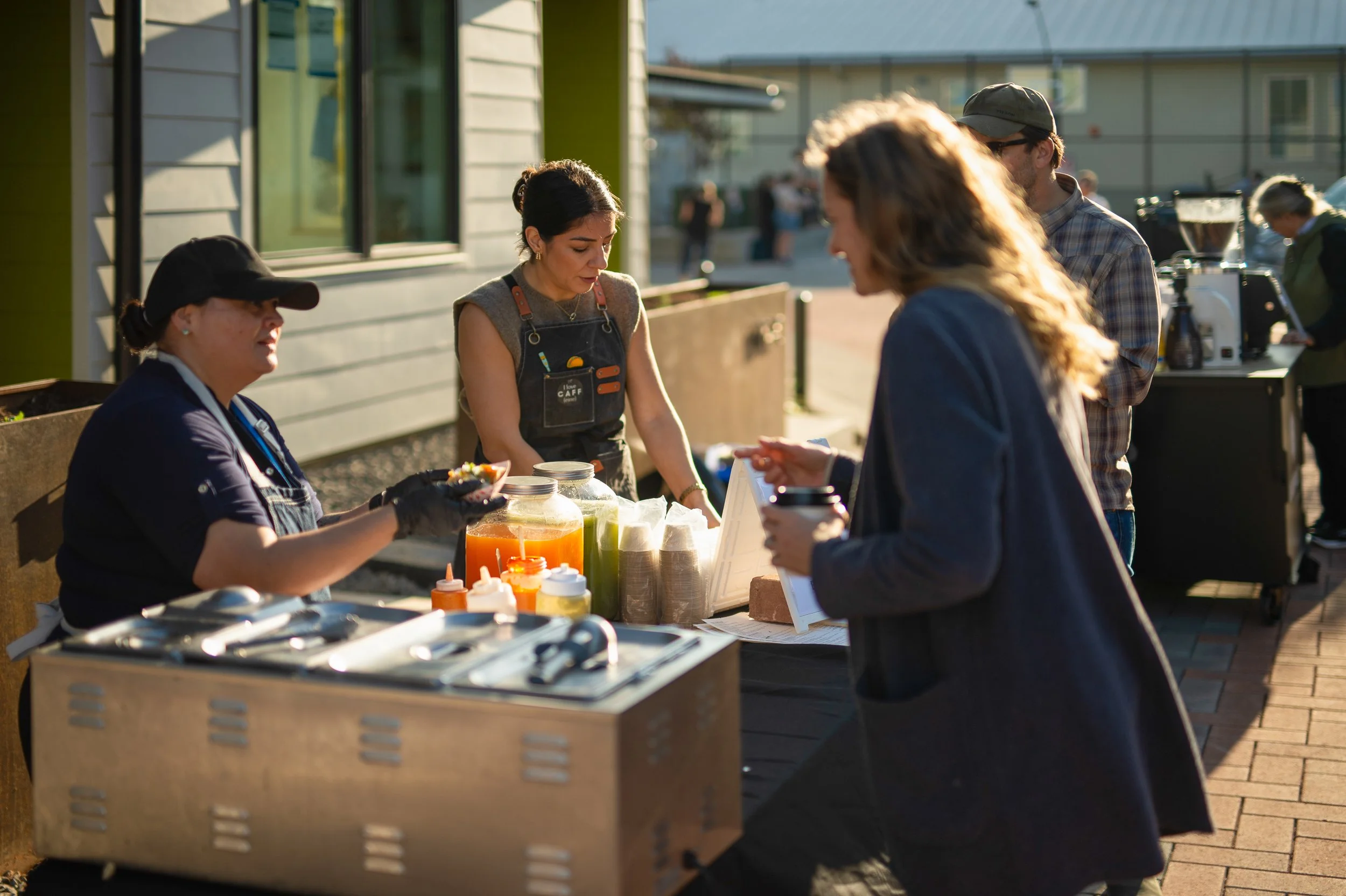 Balcon serving Block Party guests.jpg