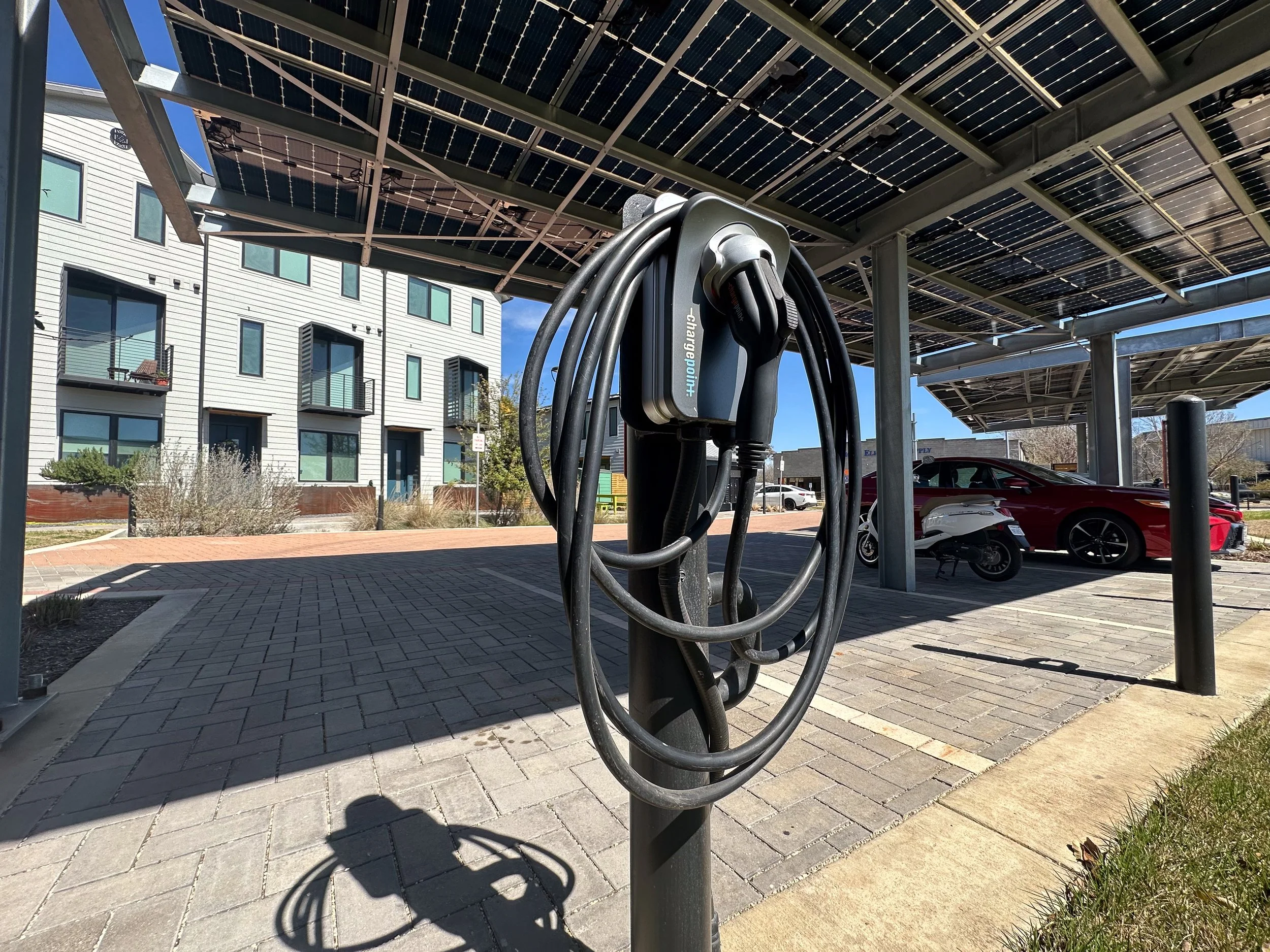 Electric Vehicle Chargepoint level 2 charger installed on a EV Charger Ready parking bollard.