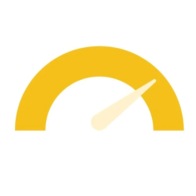 Gauge with yellow semi-circle and white needle pointing to the right