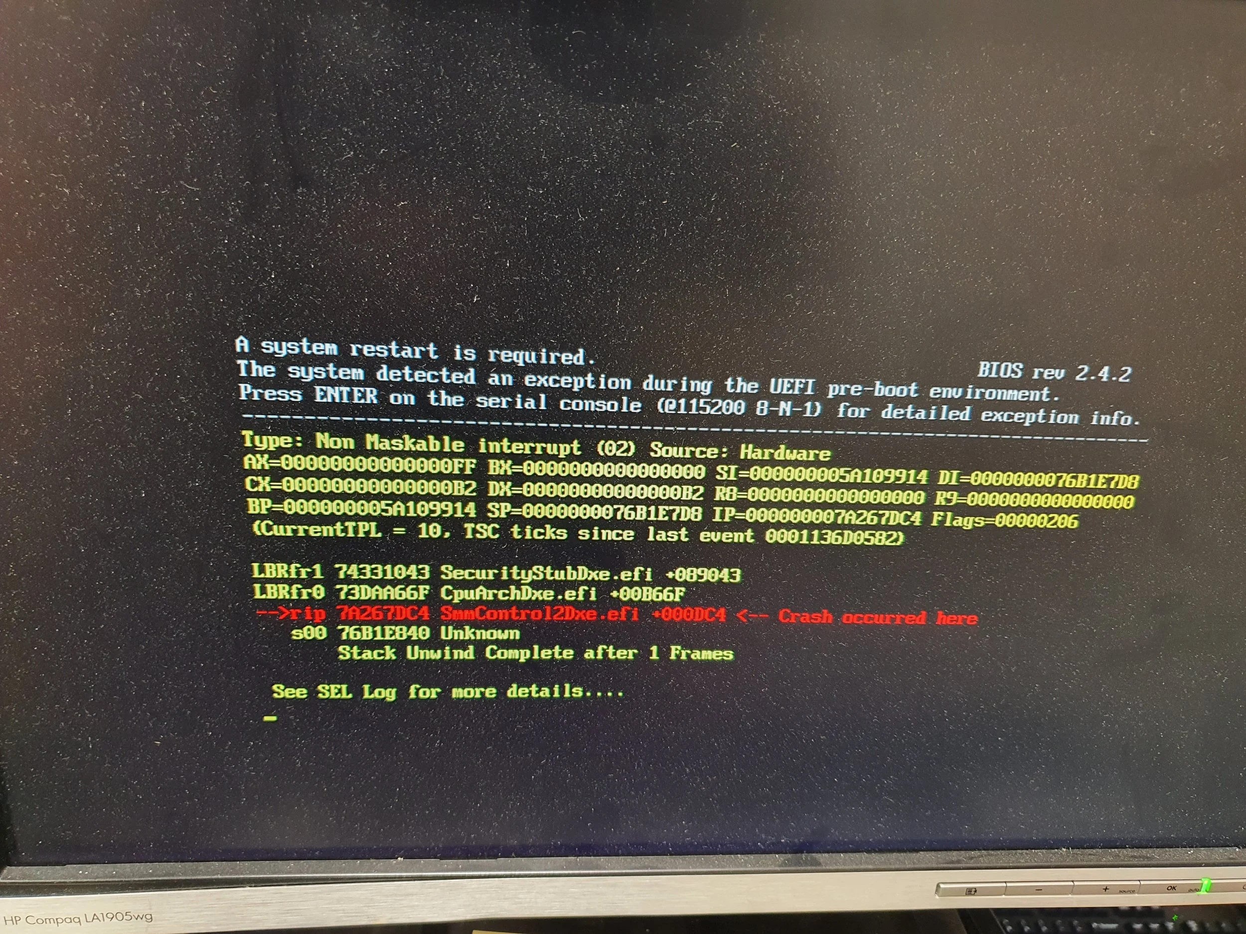 Computer screen displaying a BIOS error message indicating a system crash, with technical details and an error code, in green, red, and white text on a black background.