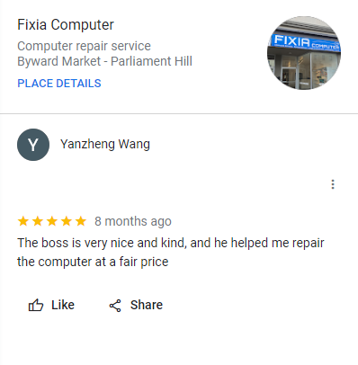 A Google review for Fixia Computer, a computer repair service at Byward Market, Parliament Hill, featuring a photo of the store's storefront with a blue sign.