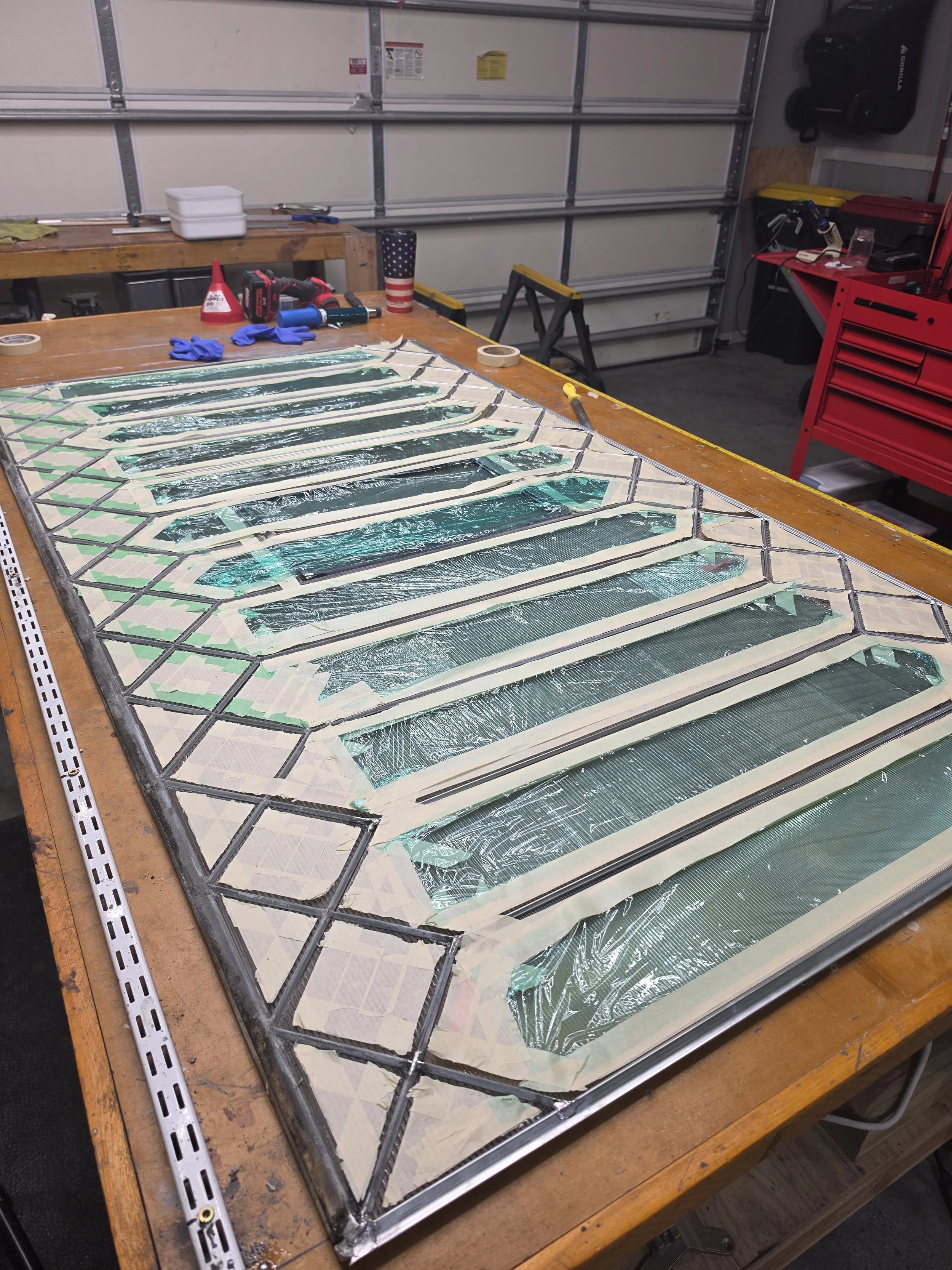 Getting to ready to apply the cement to rippled side of glass
