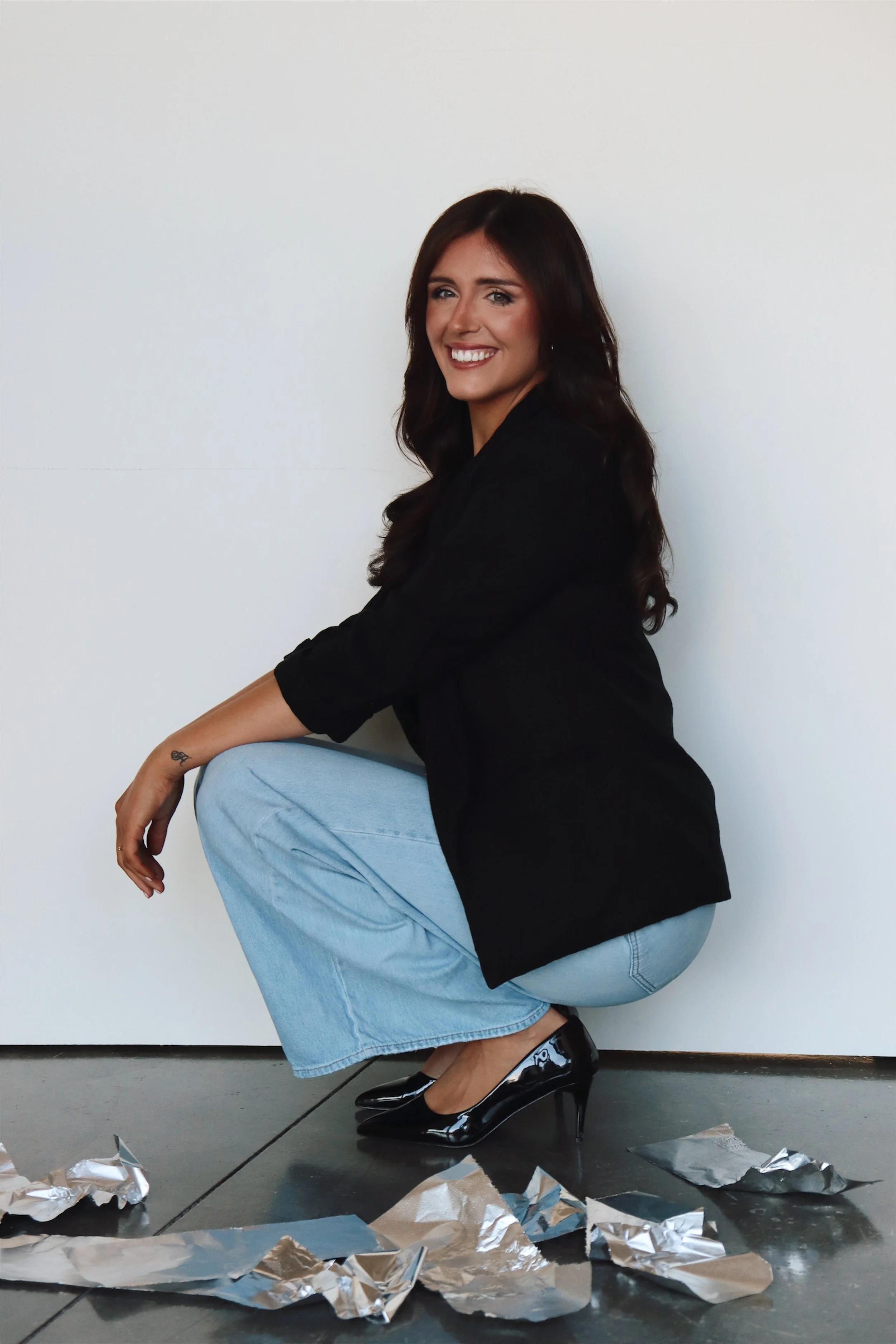 Lizzie Graham, hair stylist at The Strand Company in Evans, GA specializing in Brunettes, Makeup, Blonding, Seamless Extensions, and precision haircuts.