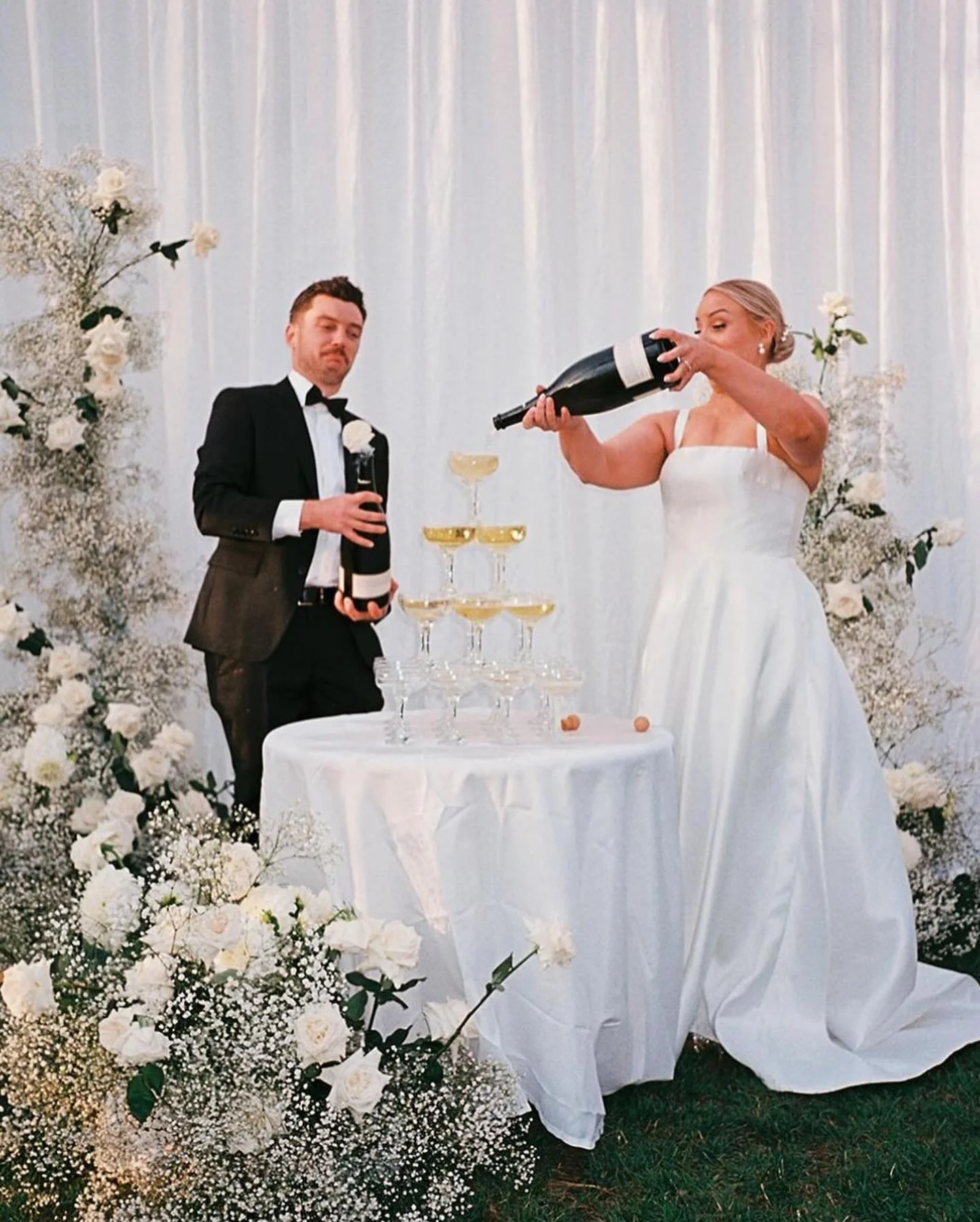 Ashlee &amp; Reuben! ❤️⁠

Love me a champagne tower 🥂 
While I dread putting that last glass on top, it&rsquo;s so worth it 🤣😅
⁠
Such a special day with so love, laughter and tears!⁠
It doesn&rsquo;t get much better than this. ⁠
The most beautiful