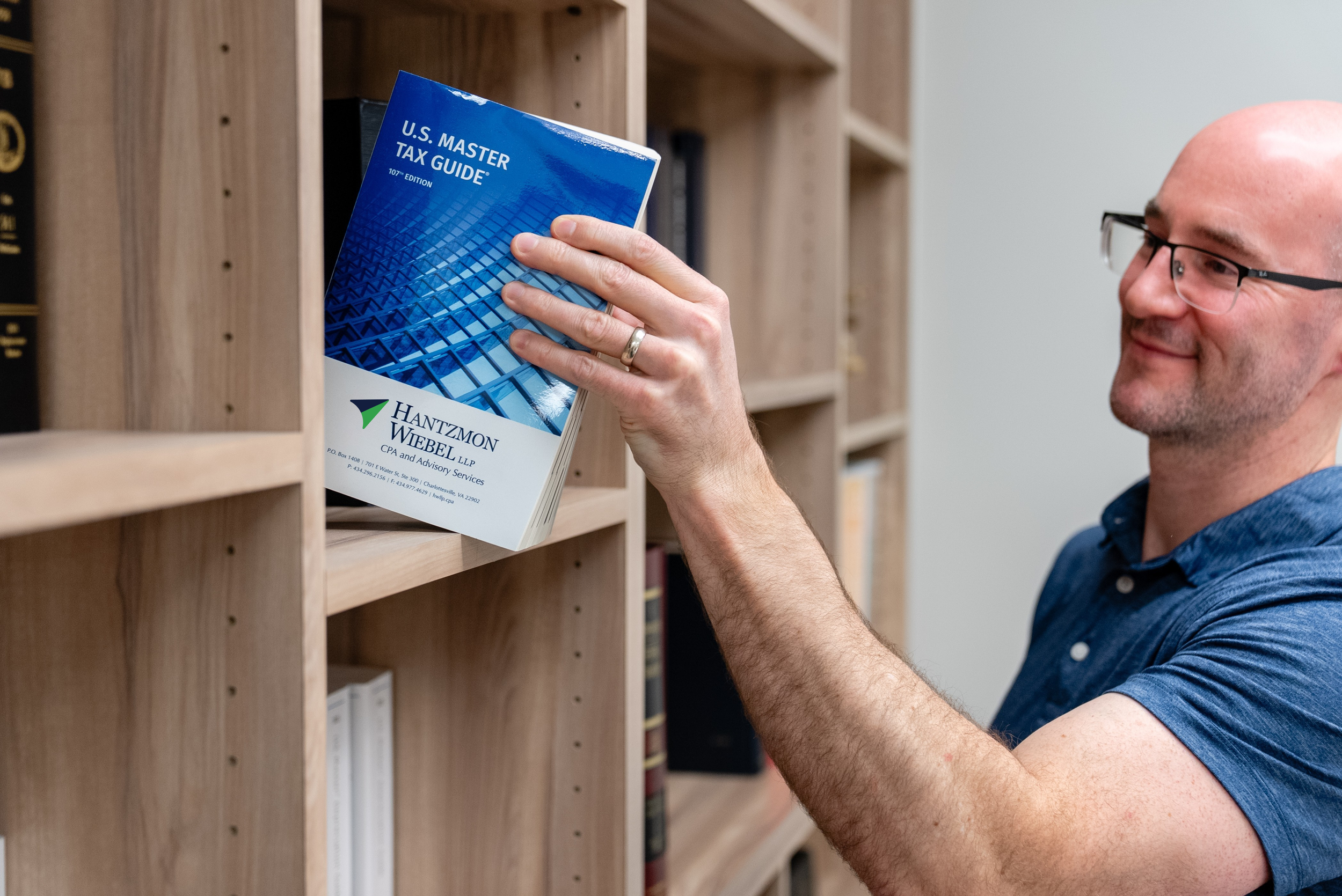 Tax professional referencing U.S. tax guide