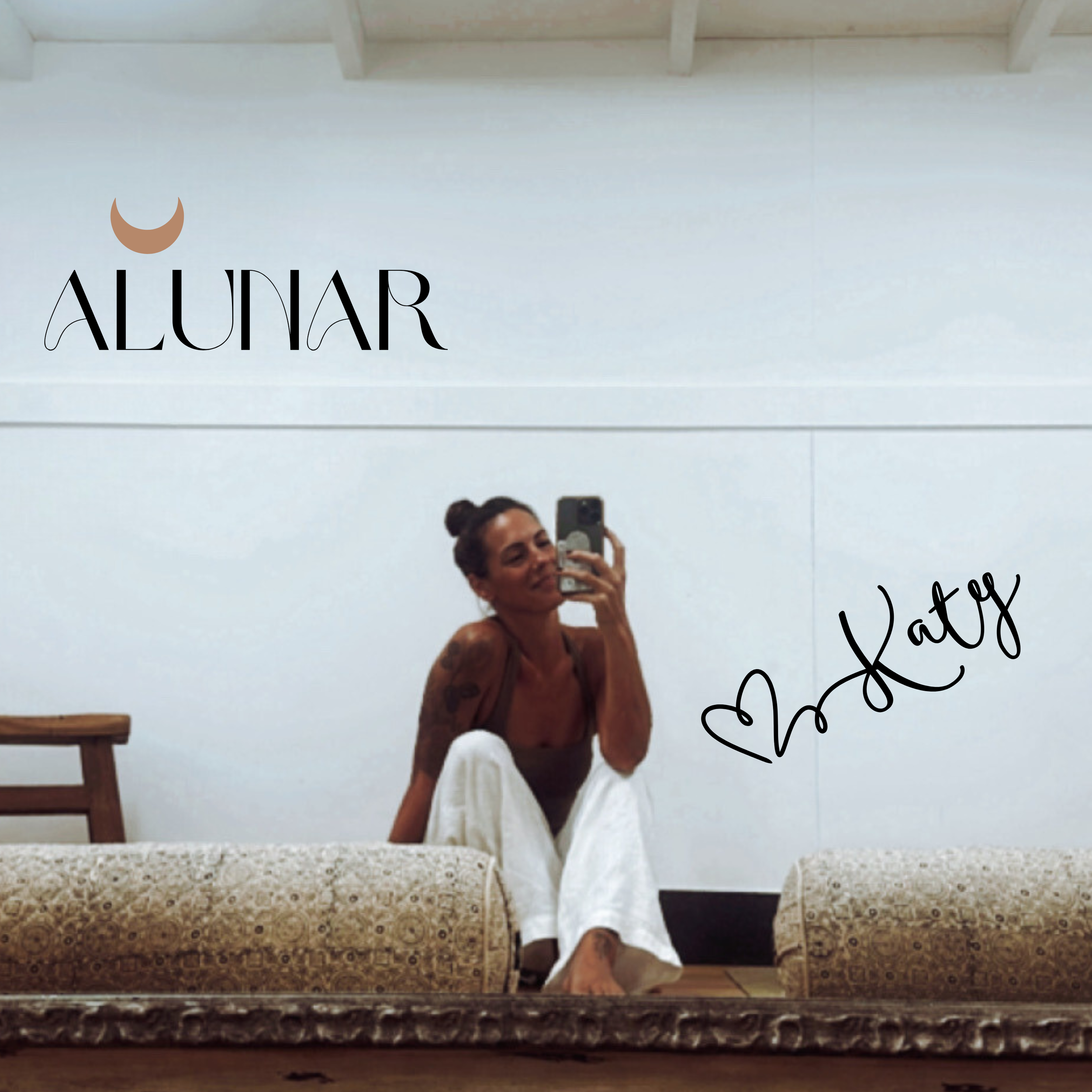 Person taking a mirror selfie in a yoga studio with cushions, text "ALUNAR" and "Katy" visible.