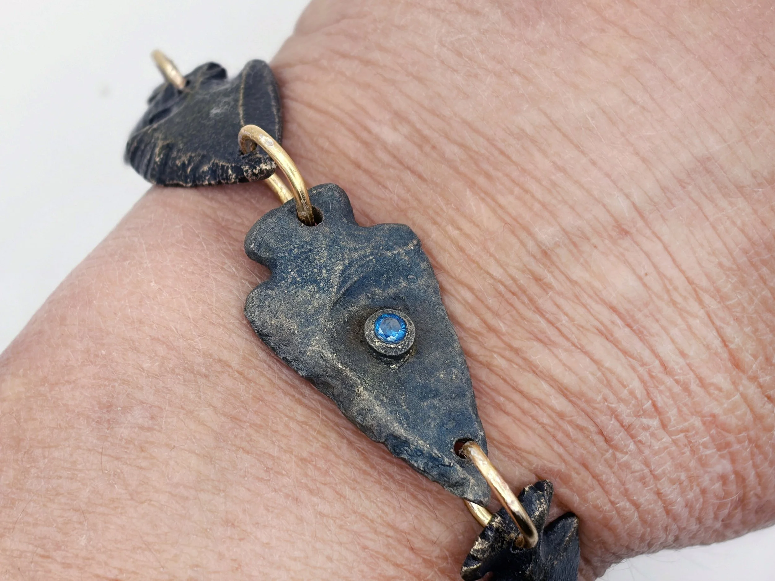 arrowhead-bracelet-bronze-topaz-detail-worn-birdley-studio.jpg