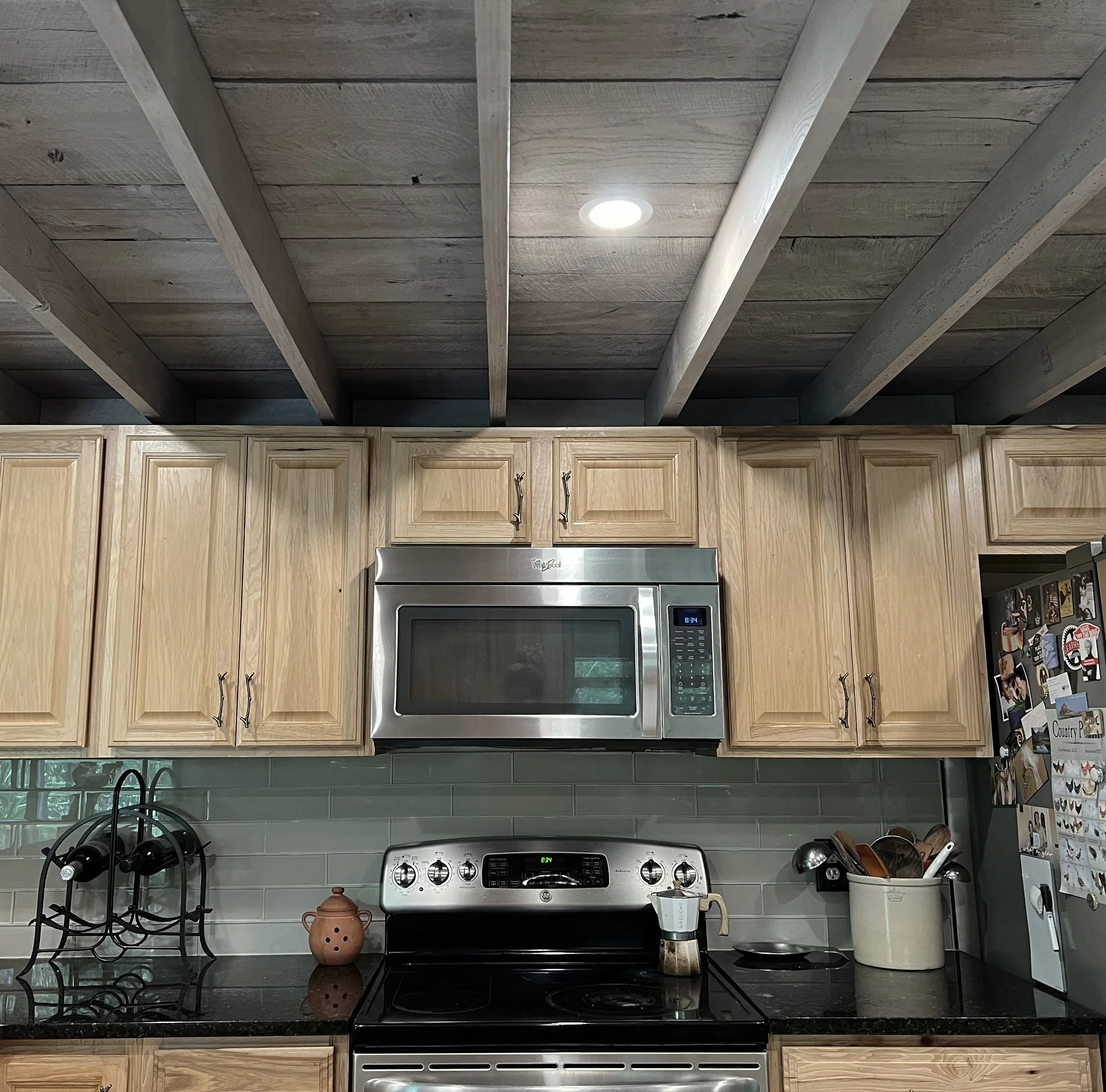 Listings Fayetteville Arkansas Stove rafters and backsplash detail.jpg