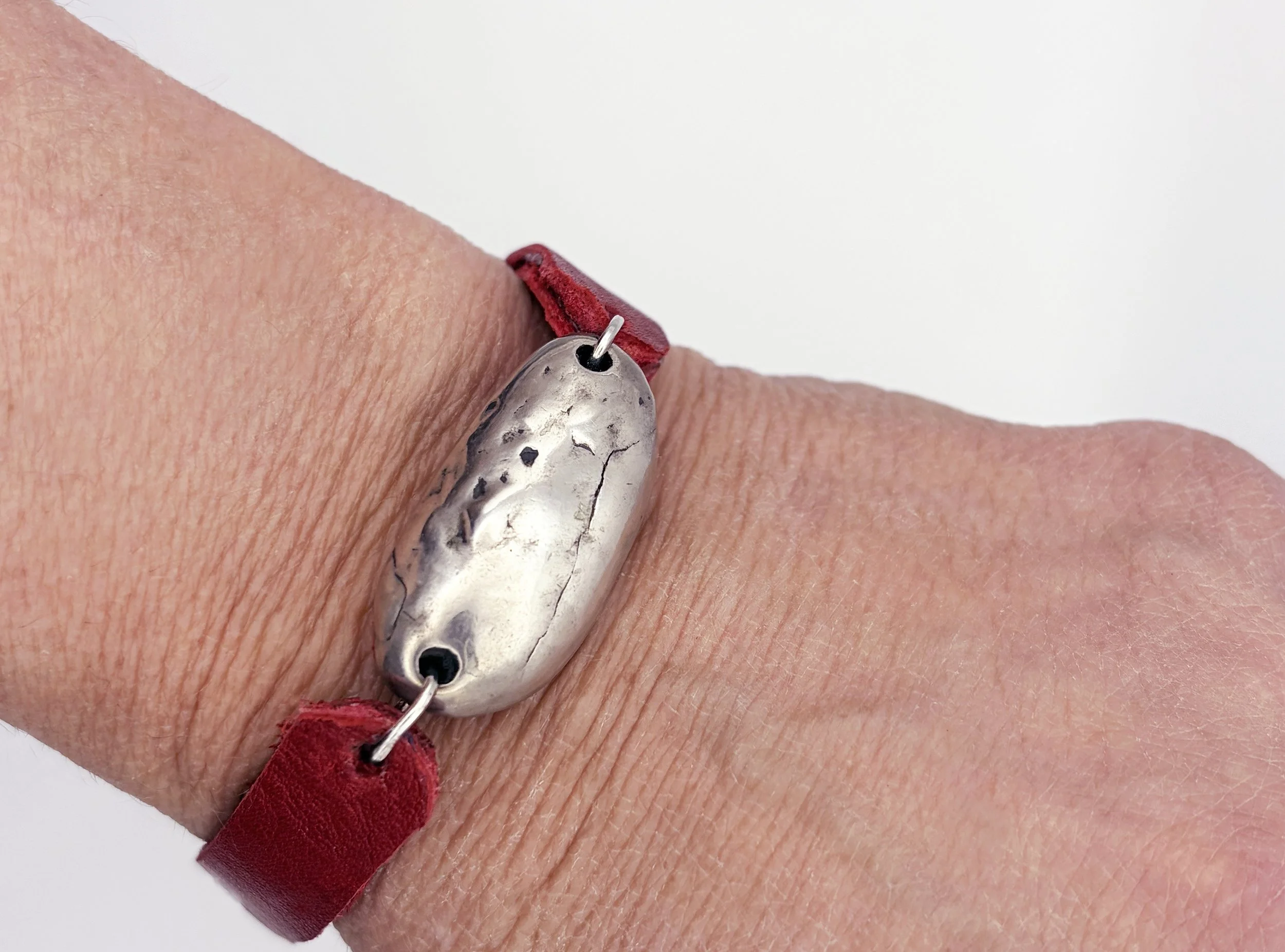 river-stone-single-bracelet-white-copper-leather-red-birdley-studio.jpg
