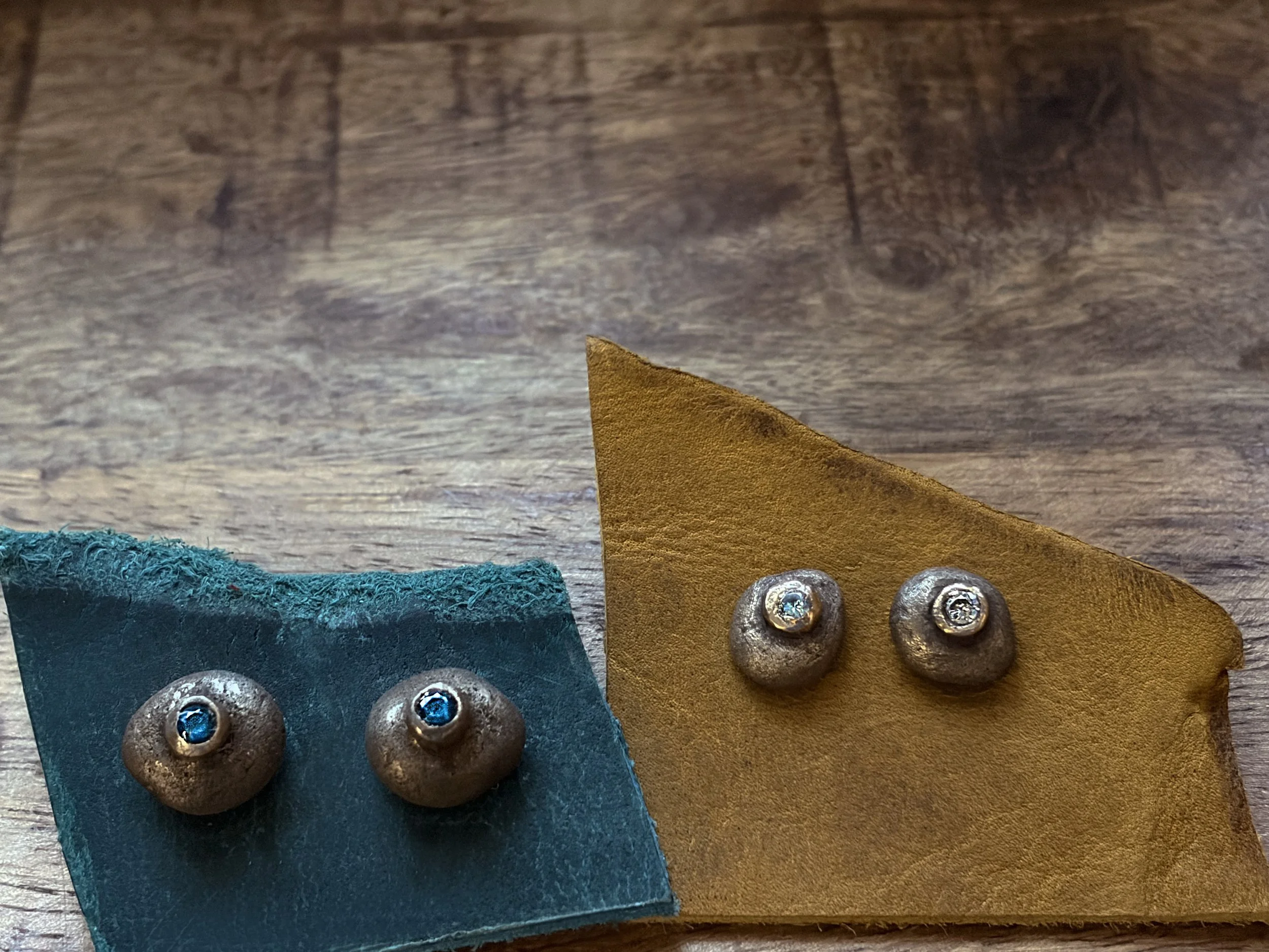 river-rock-stud-earrings-round-small-bronze-gemstone-white-turquoise-overhead-birdley-studio.jpg