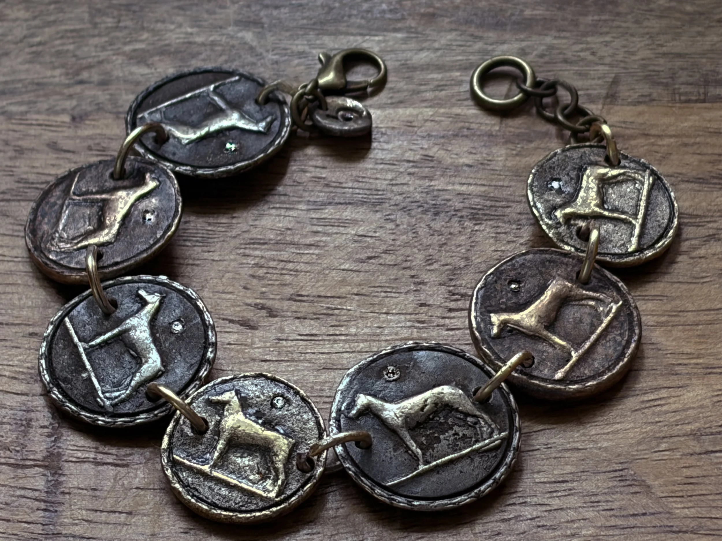 best-in-show-dog-bracelet-bronze-gemstones-full-overhead-birdley-studio.jpg