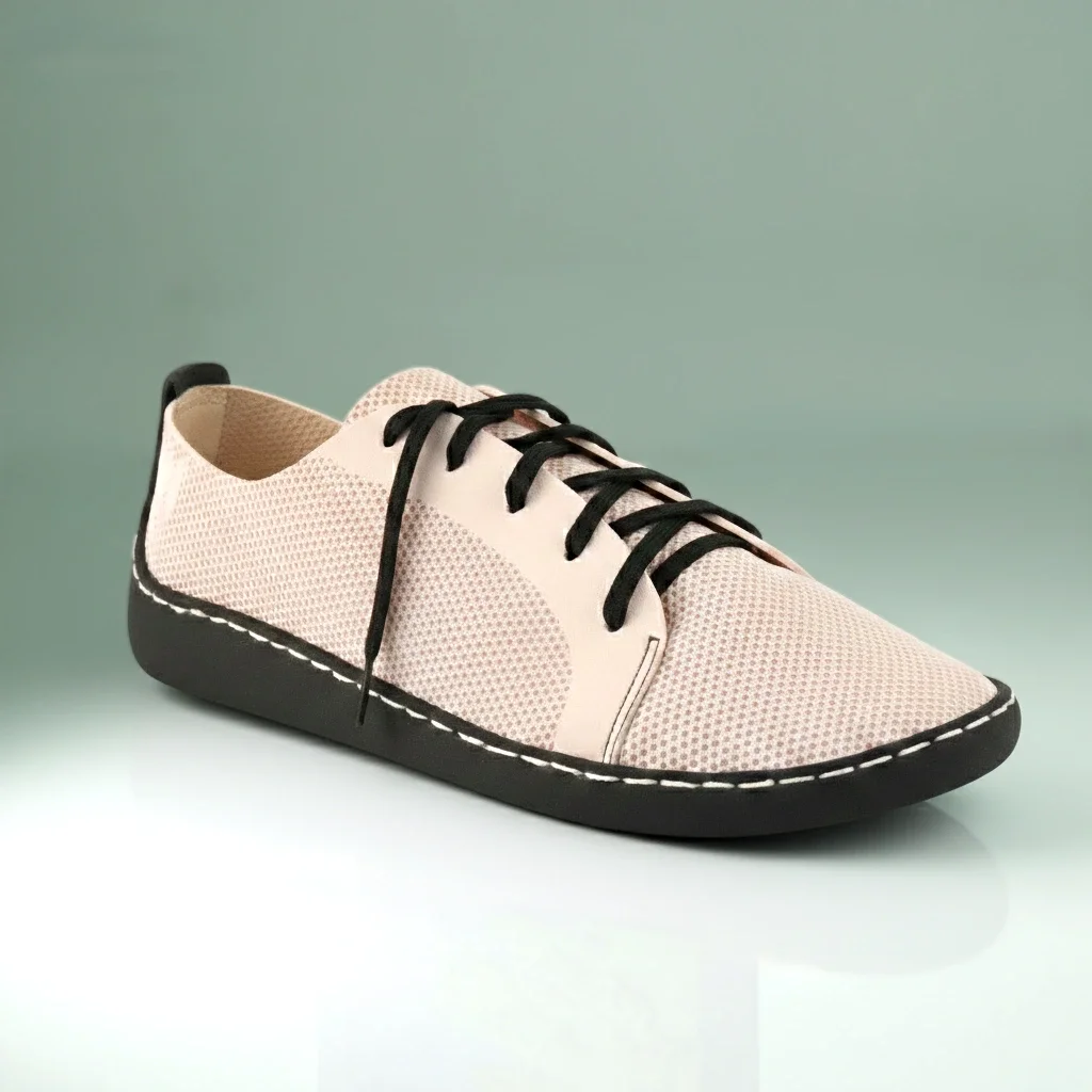 Sustainable 3D printed lifestyle shoe with textured mesh upper and black laces, demonstrating WAZP decentralized footwear manufacturing solutions.