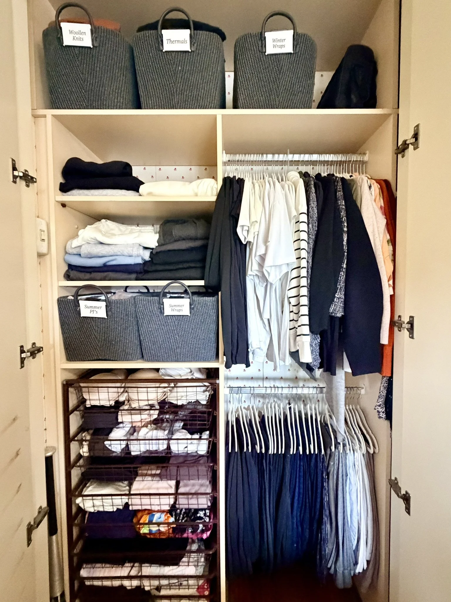 Organised womens wardrobe after