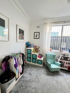 Organised girls playroom after