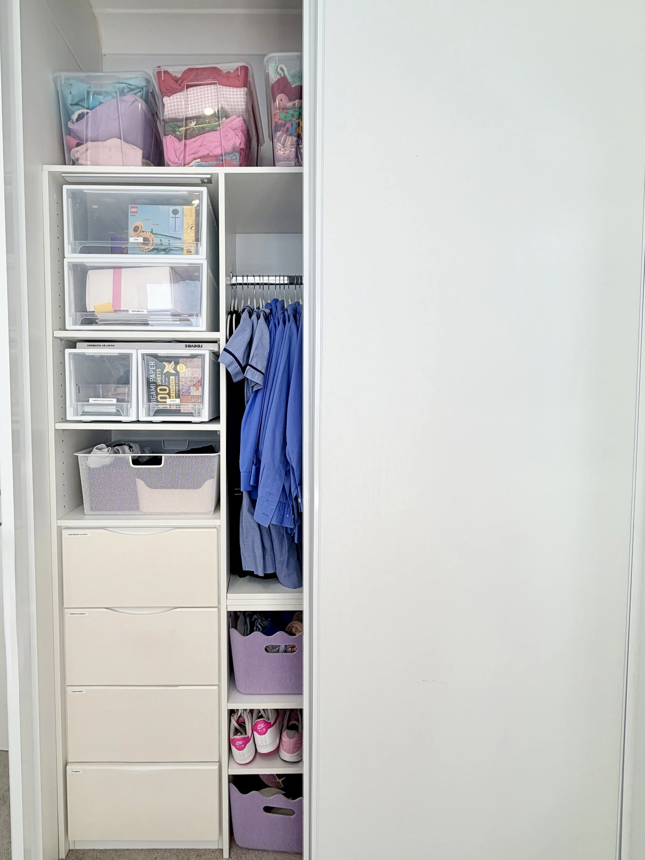 Organised girls wardrobe after