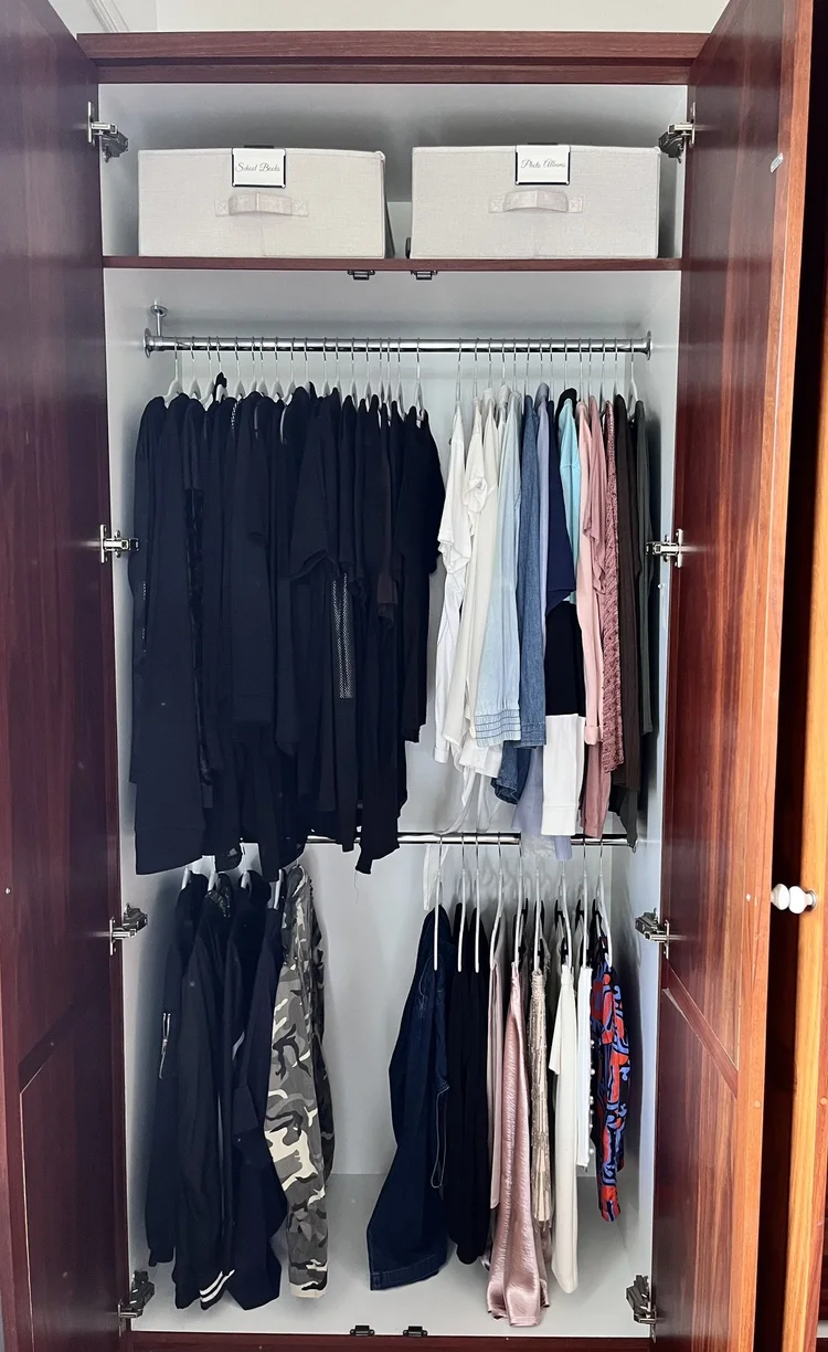 Organised wardrobe after