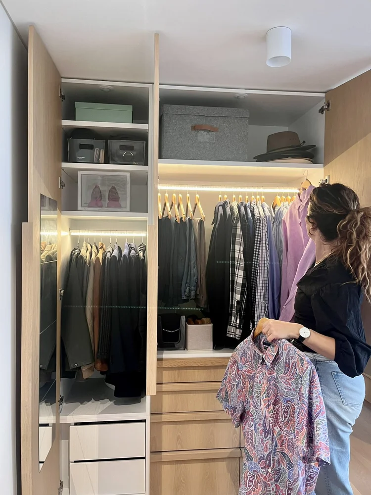 Organised wardrobe after