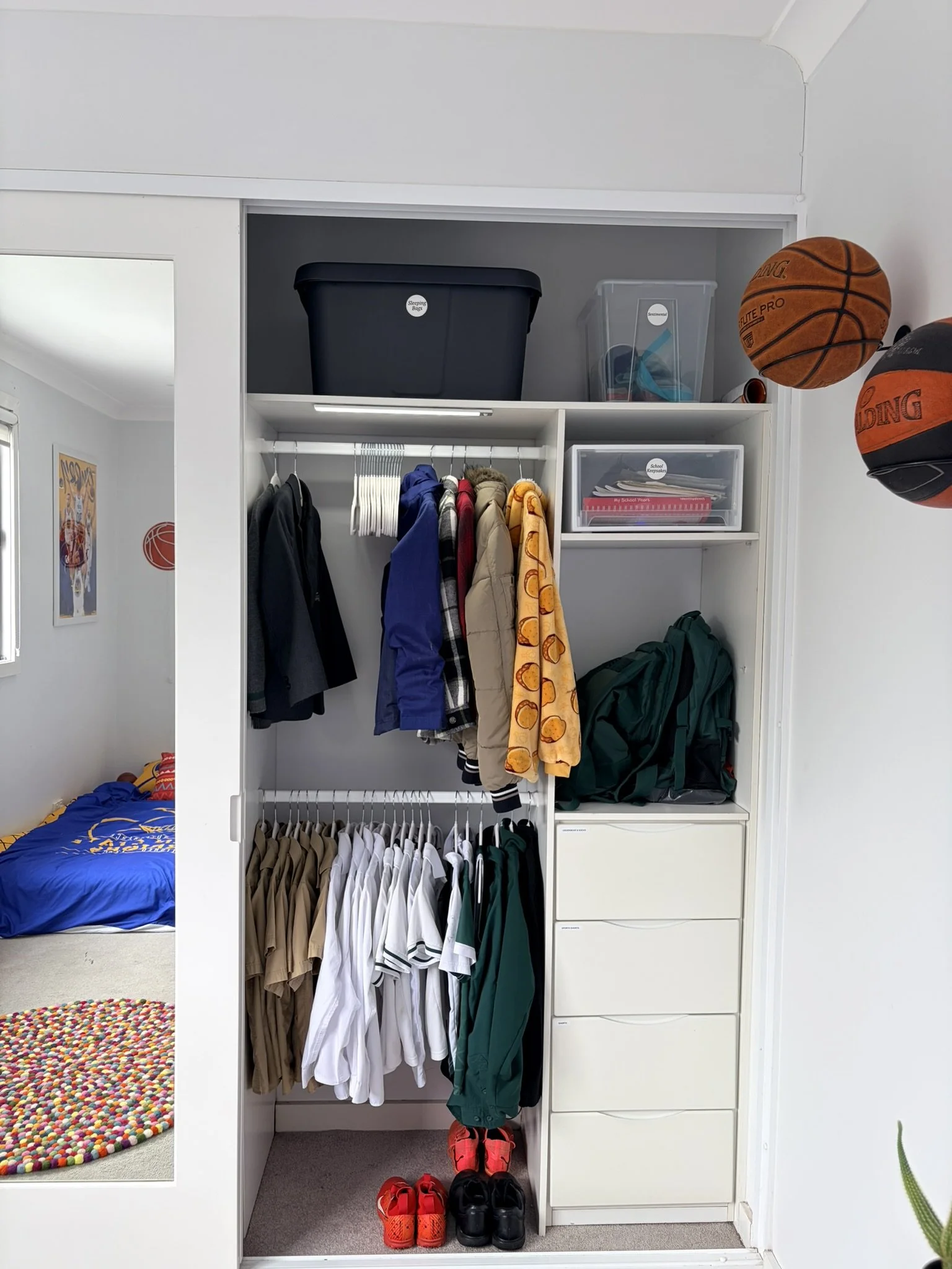 Organised boys wardrobe after