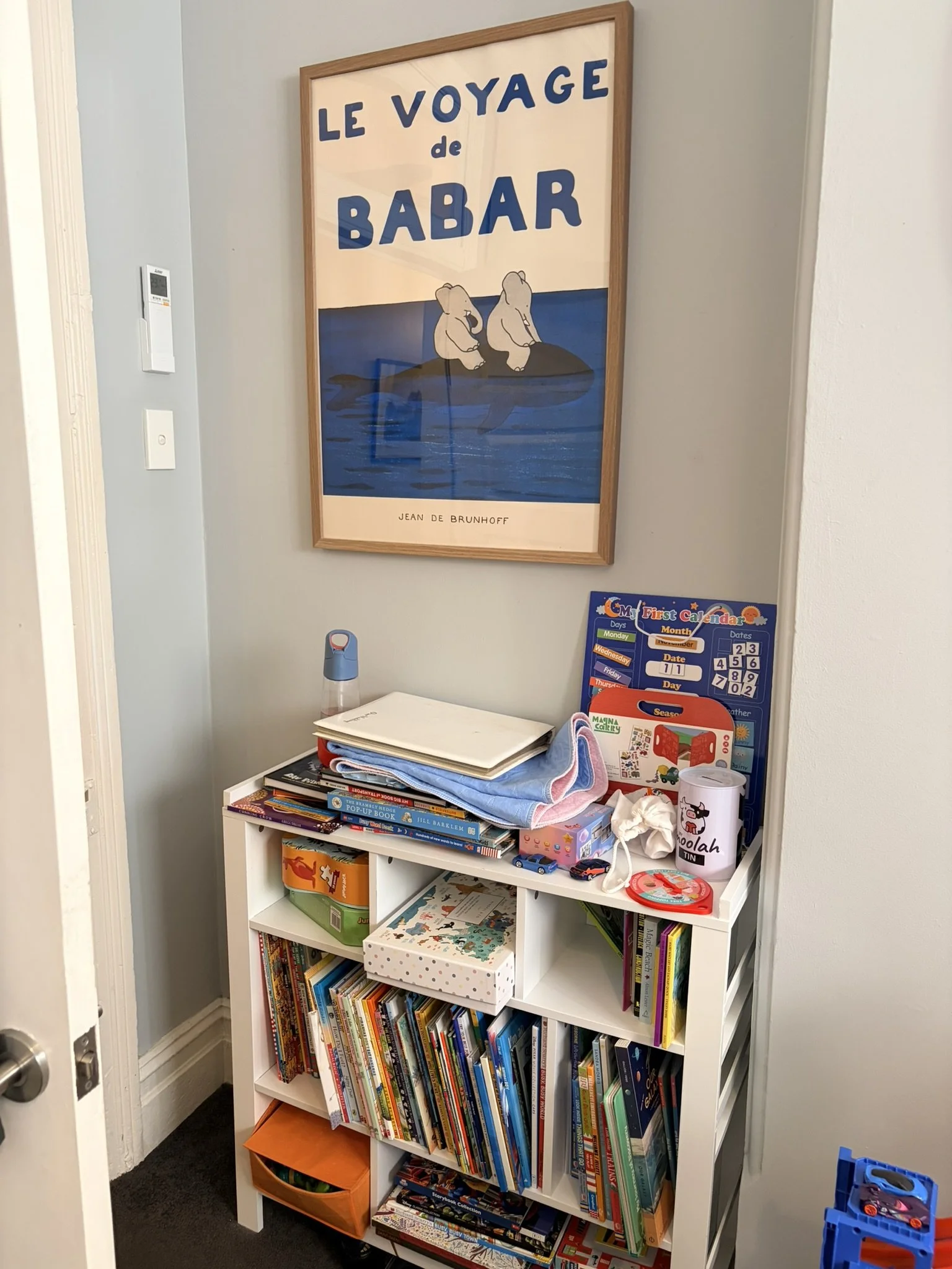 Boys bookcase before