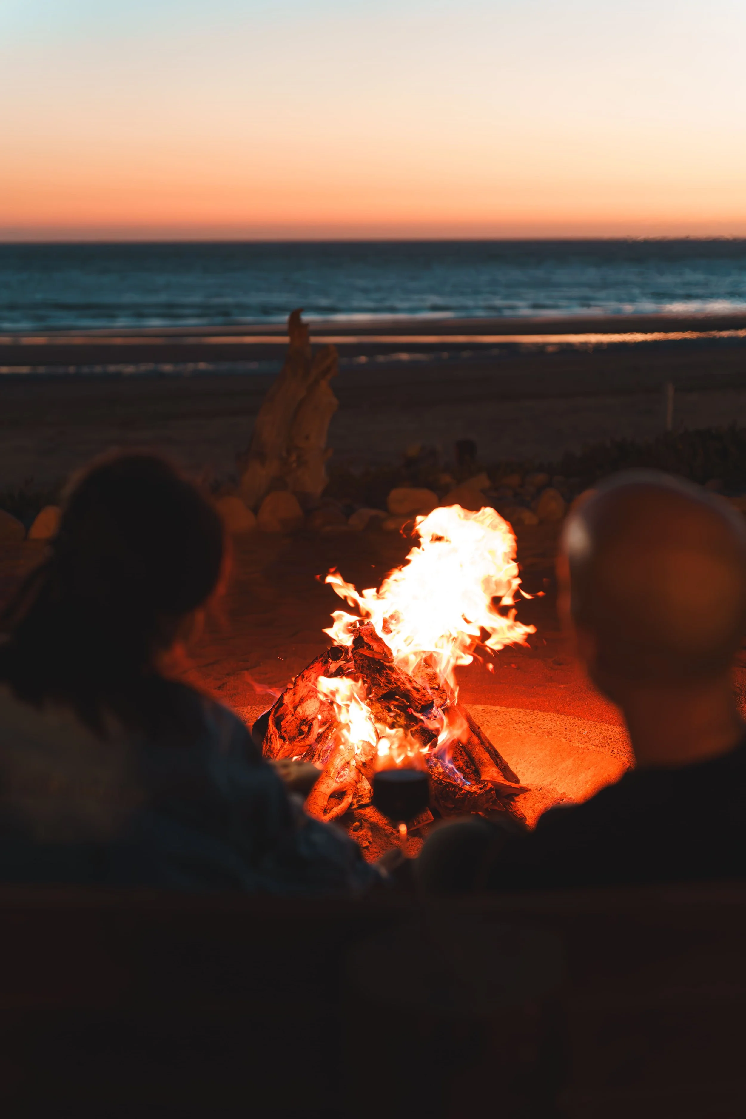 resort-oceanfront-campfire-sunset.jpg