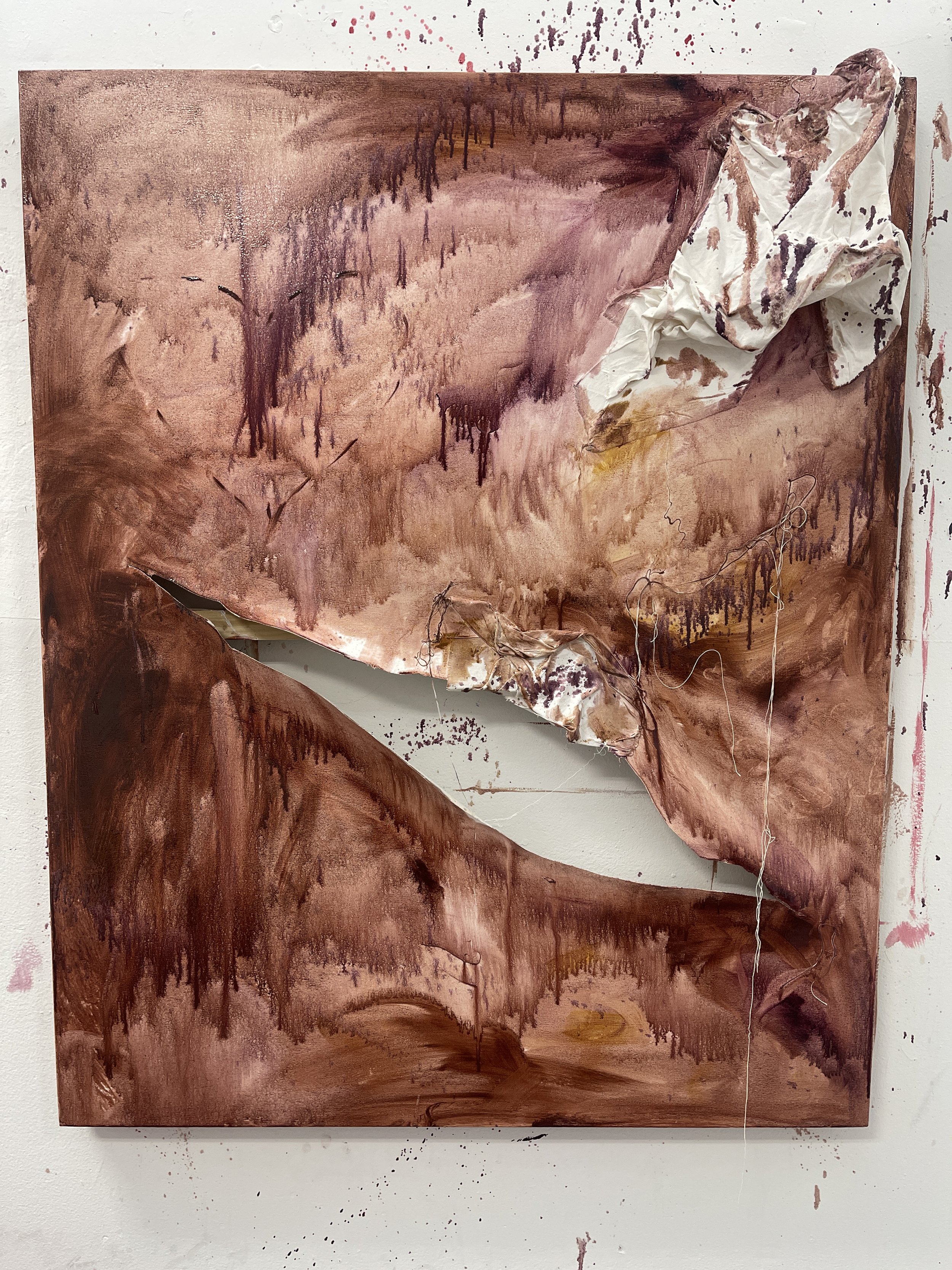 Tearing canvas and adhering fabrics to the surface in beginning stages of an abstract bodiky painting, giving a slight clue as to how these works were formulated.