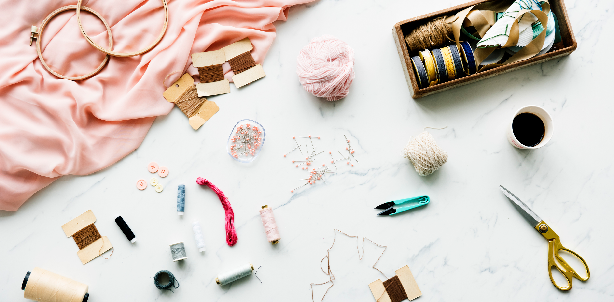 Close-up of custom garment decoration showing embroidered textile detail on retail merchandise