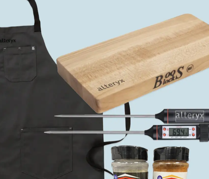 Laser etched custom design on a wooden cutting board showing precise artwork engraving and distressed finish decoration technique