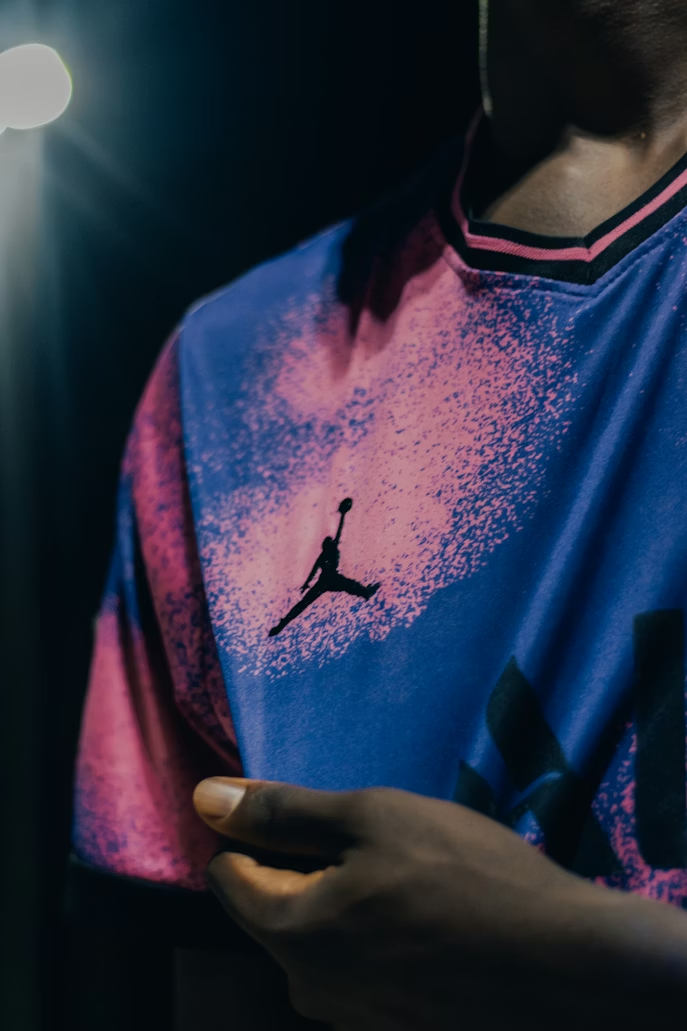 Full-color dye sublimation print on polyester apparel showing all-over edge-to-edge custom decoration for retail merchandise