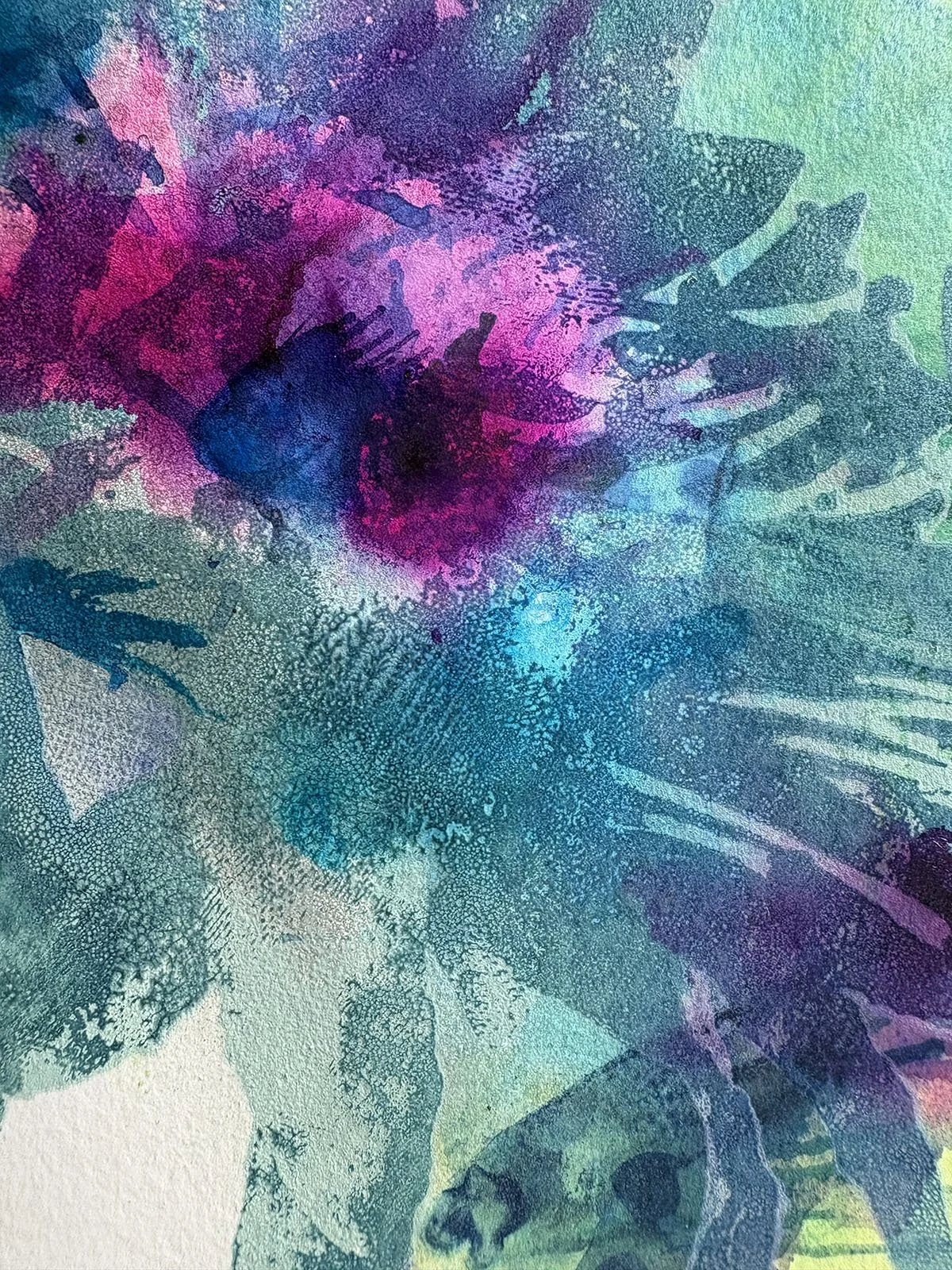 Abstract watercolor painting with vibrant shades of blue, purple, pink, and green, featuring leaf and plant-like shapes.
