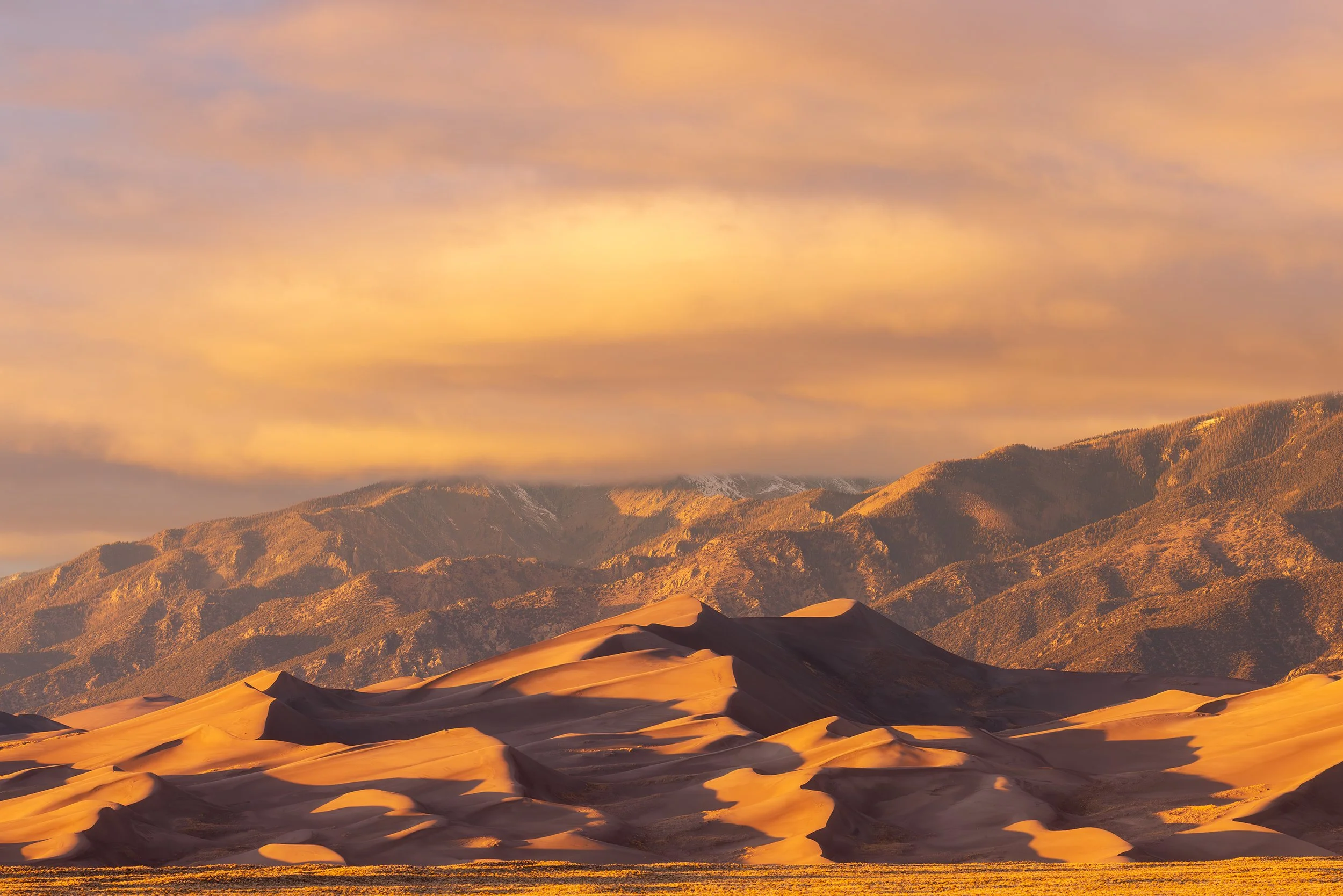 great-sand-dunes-national-park-colorado-desert-dunes-sangre-de-cristo-mountains-winter-sunset.jpg