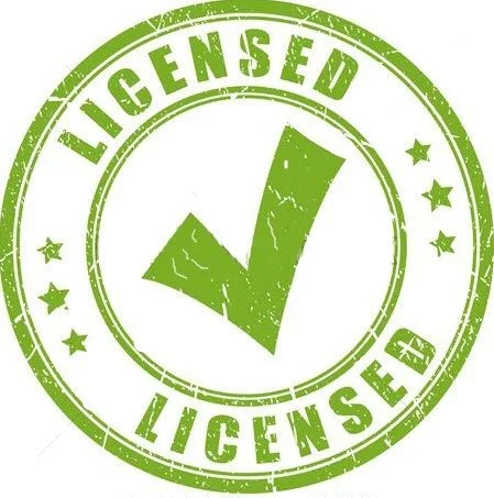 Green circular stamp with the words "LICENSED" written twice around the border and a large check mark in the center.
